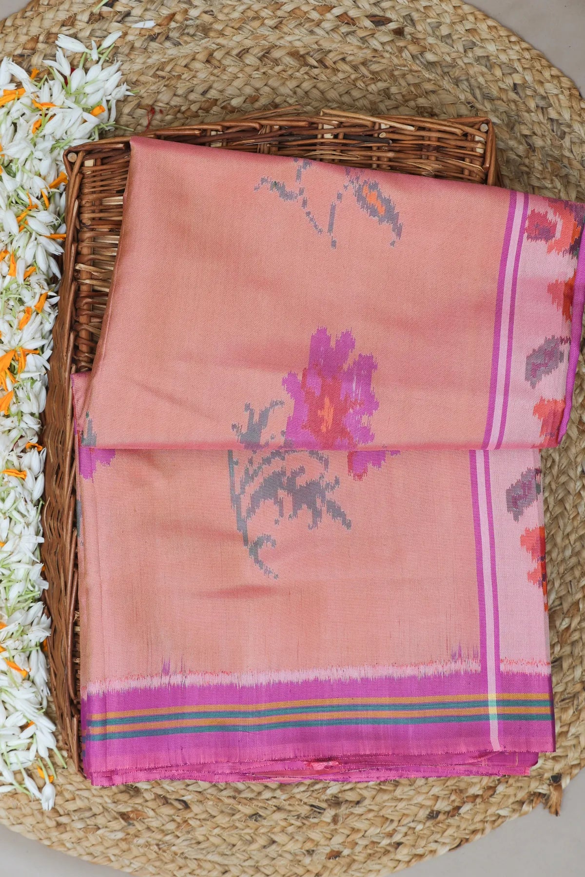 Masterpiece fancy flowers design semi double ikat patola saree