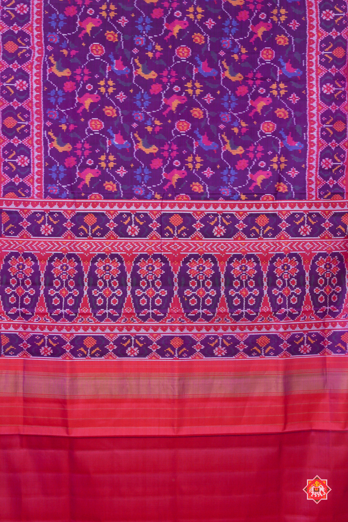 Vell design with motif design ghughroo border semi double ikat patola saree