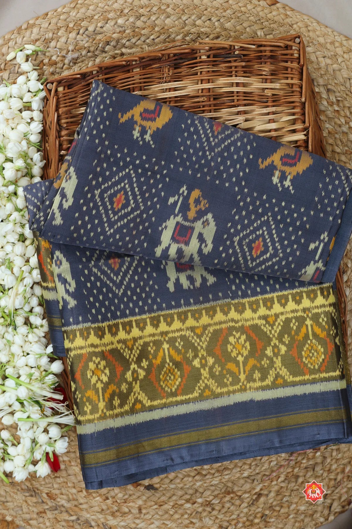 Motif design with tissue ghughroo border single ikat patola saree