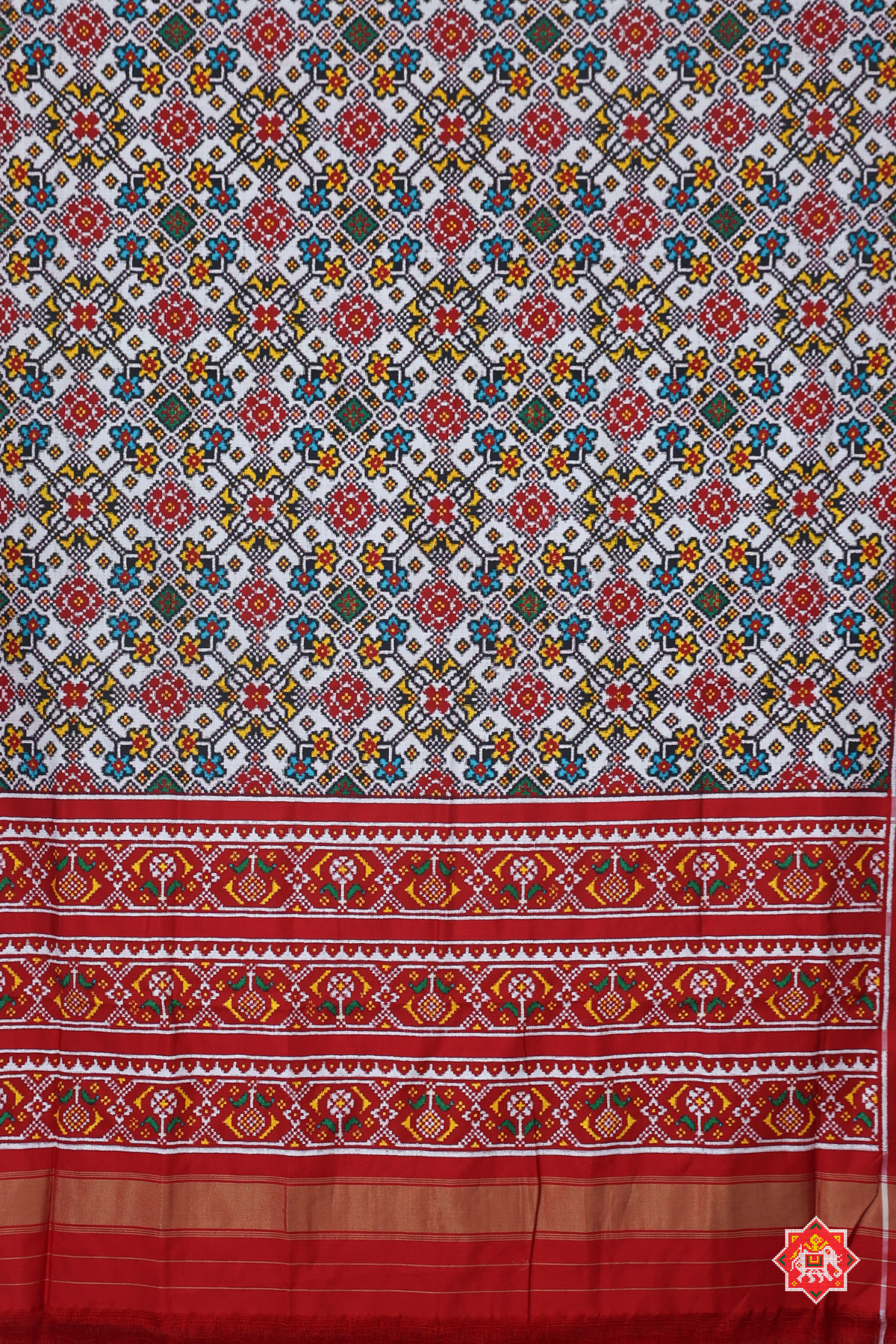 Traditional navratna design with small border pure double ikat patola saree