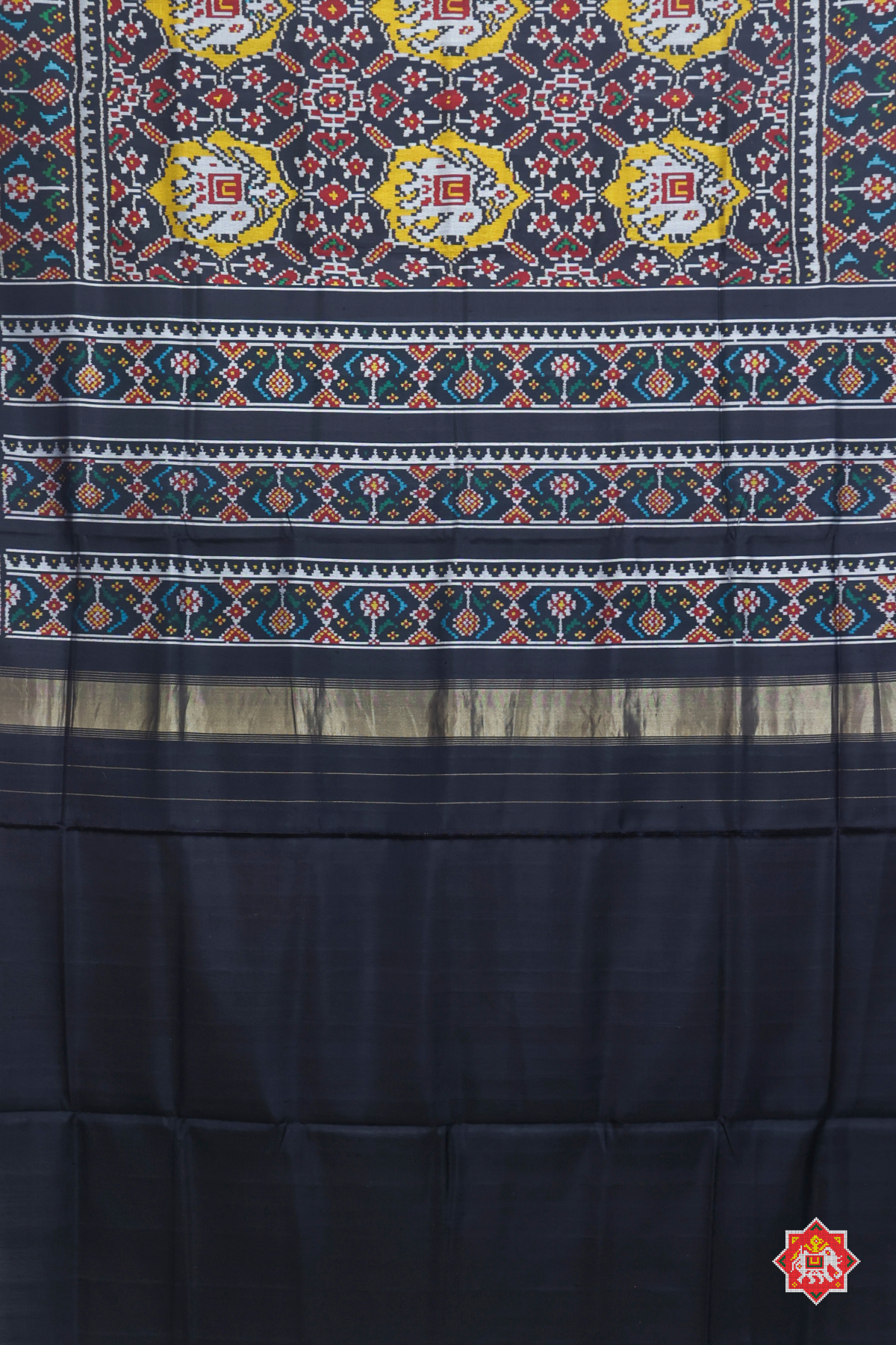 Maneck chowk design with elephant pallu border ghughroo design semi double ikat patola saree