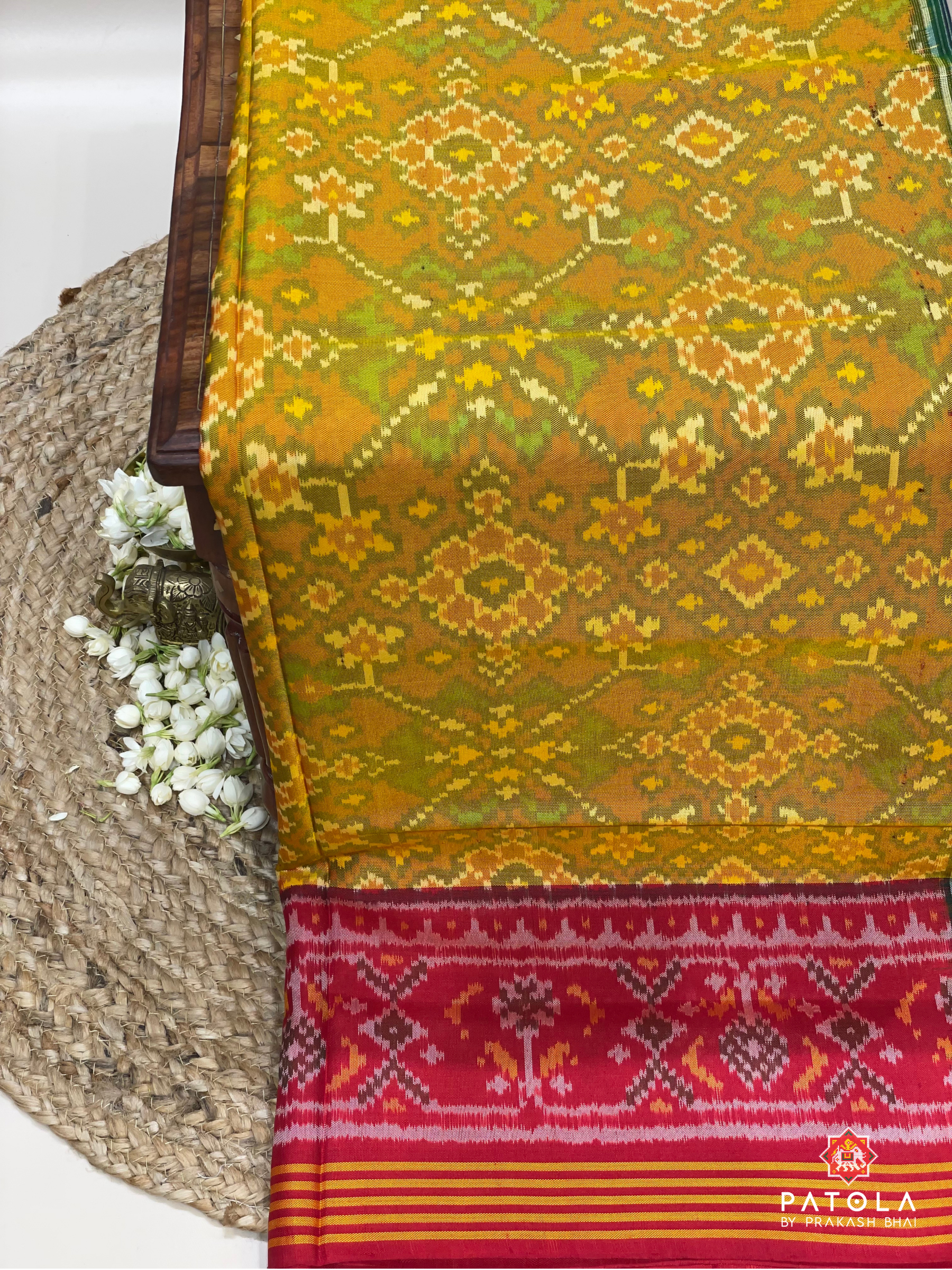 Traditional Navratna Design With Two Color Border Pallu Contrast Semi Double Ikat Saree