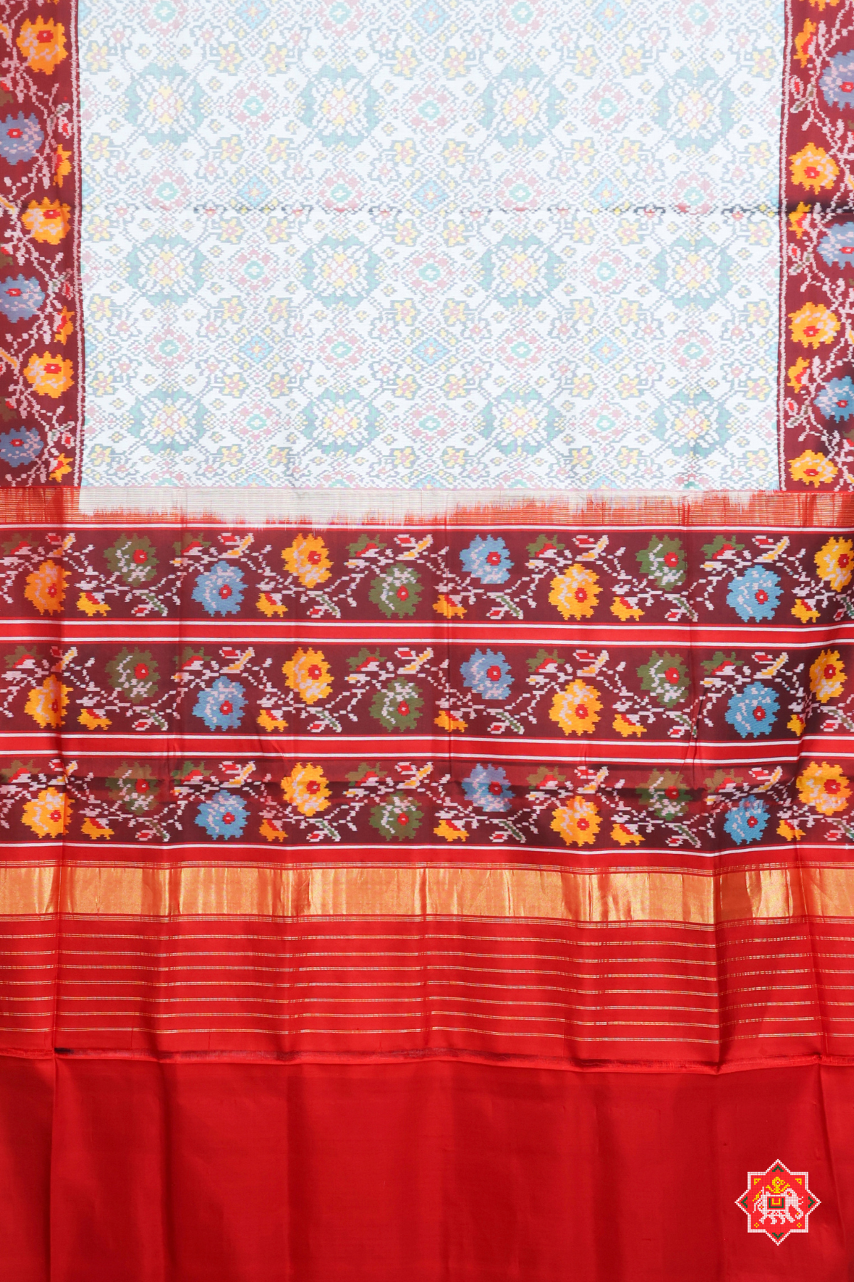 Traditional navrat design minakari work with flower border design semi double ikat patola saree