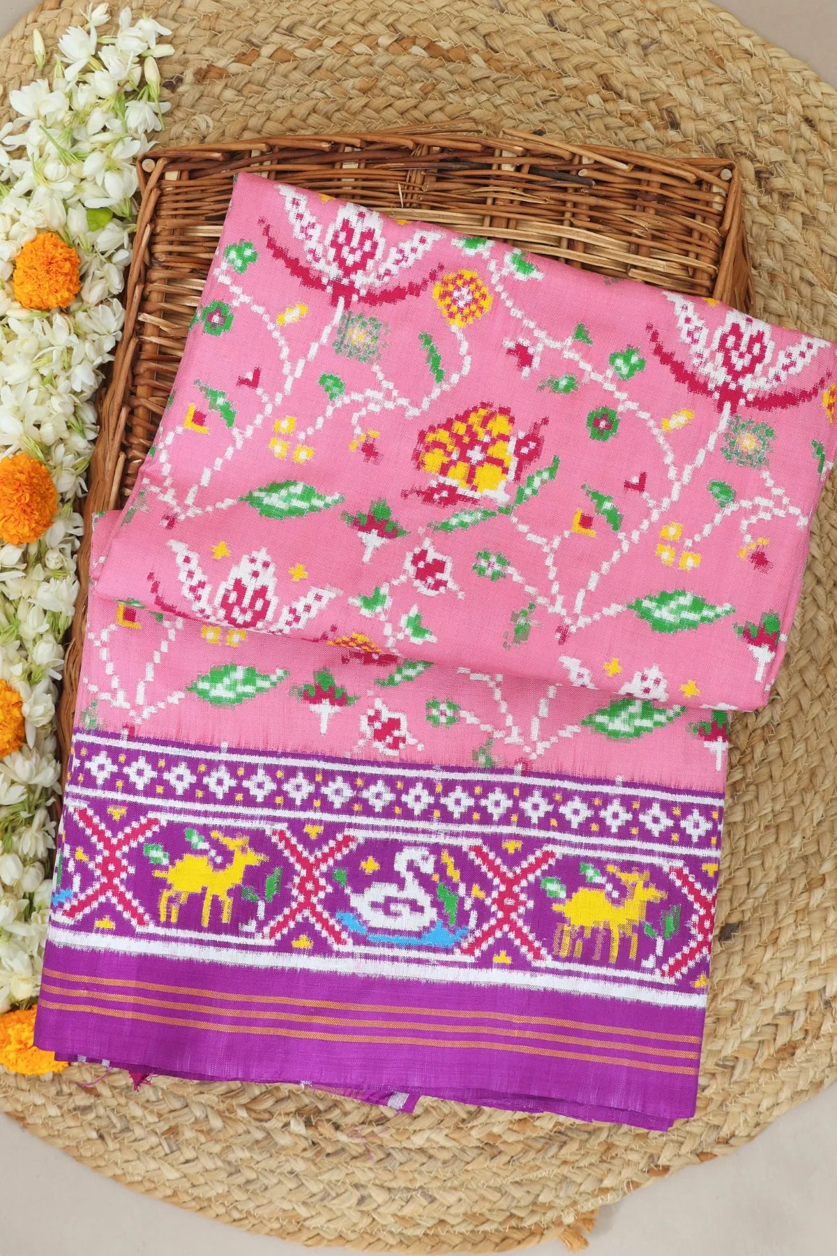 Patan patola traditional master piece rangoli design with border pallu motif design double ikat saree