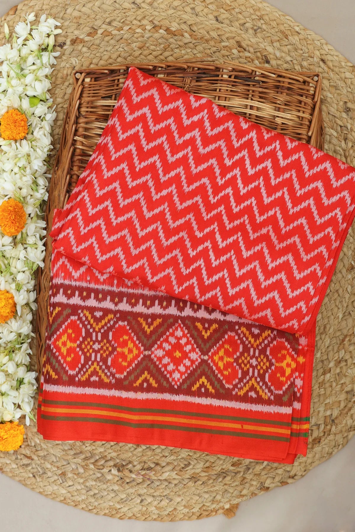 Zig-zag with pallu border flower design semi double ikat patola saree