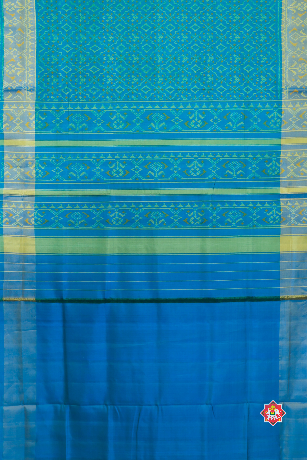 Button full design with tissue border single ikat patola saree