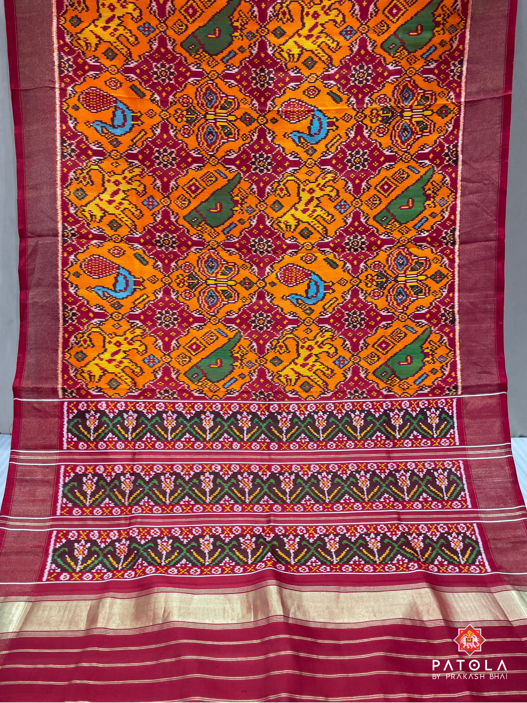 4 Figures With Chhabdi Designer Twill Patola Saree