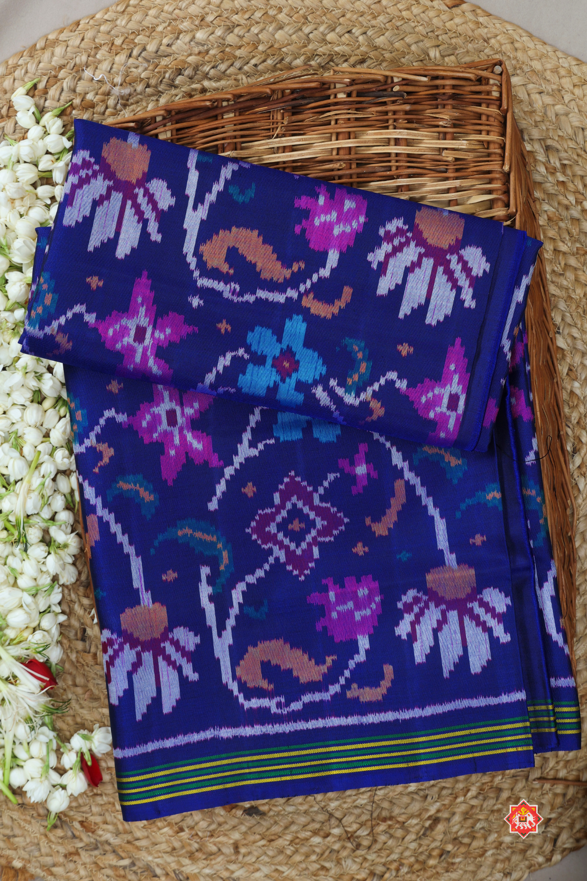 Master piece flowers with leaves design & small lines border semi double ikat patola saree