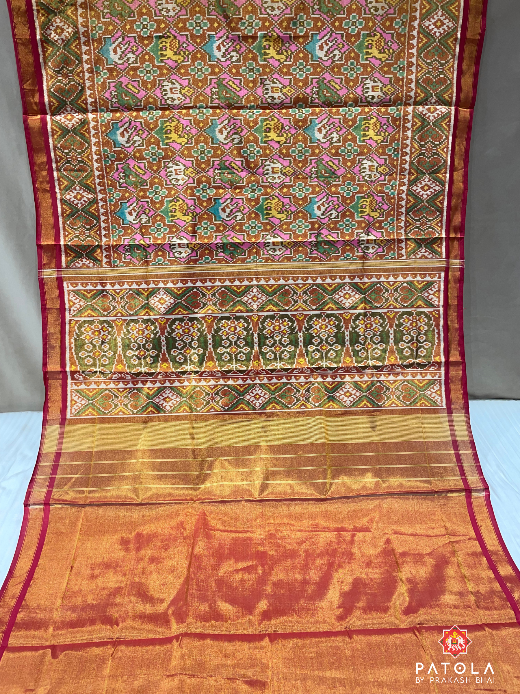 Figures With Star Designer Tissue Patola Saree