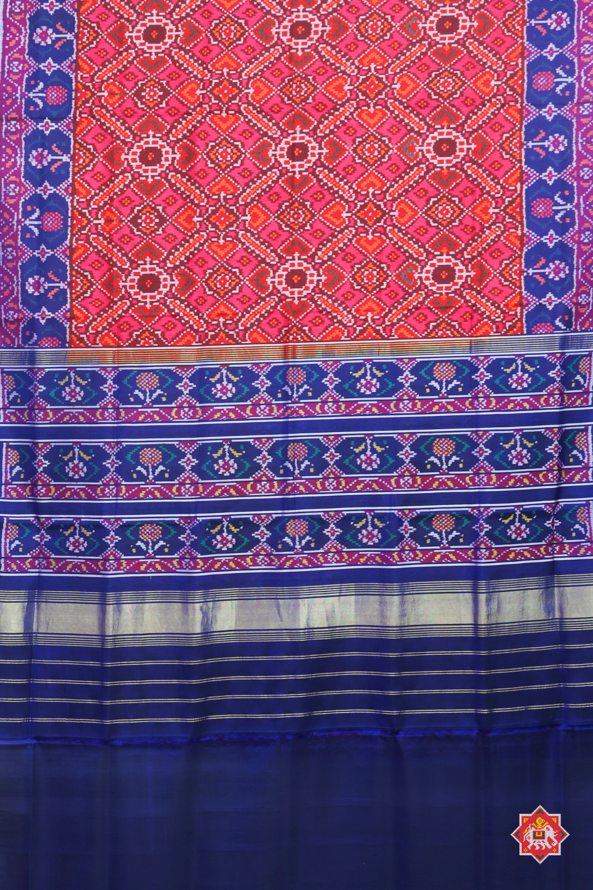 Traditional manek chowk design with ghughroo border Semi double ikat patola saree