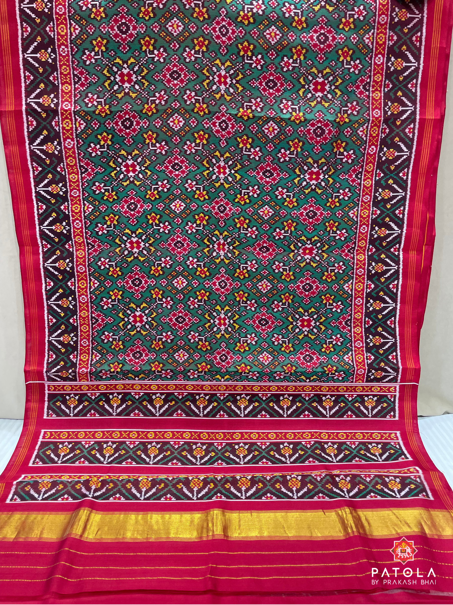 Green Navratna Designer Twill Patola Saree