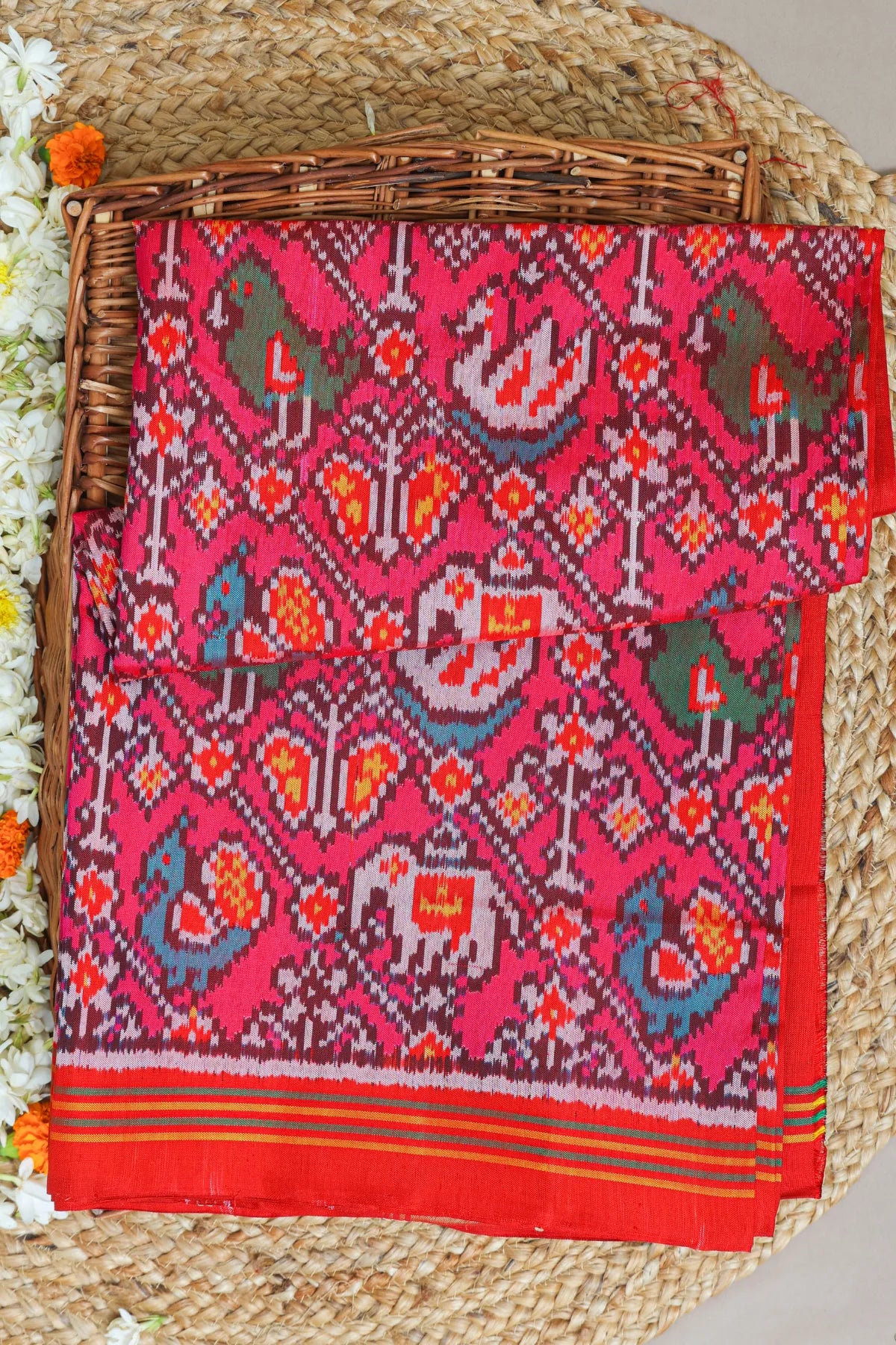 Cross laheriya with motifs design semi double ikat patola saree