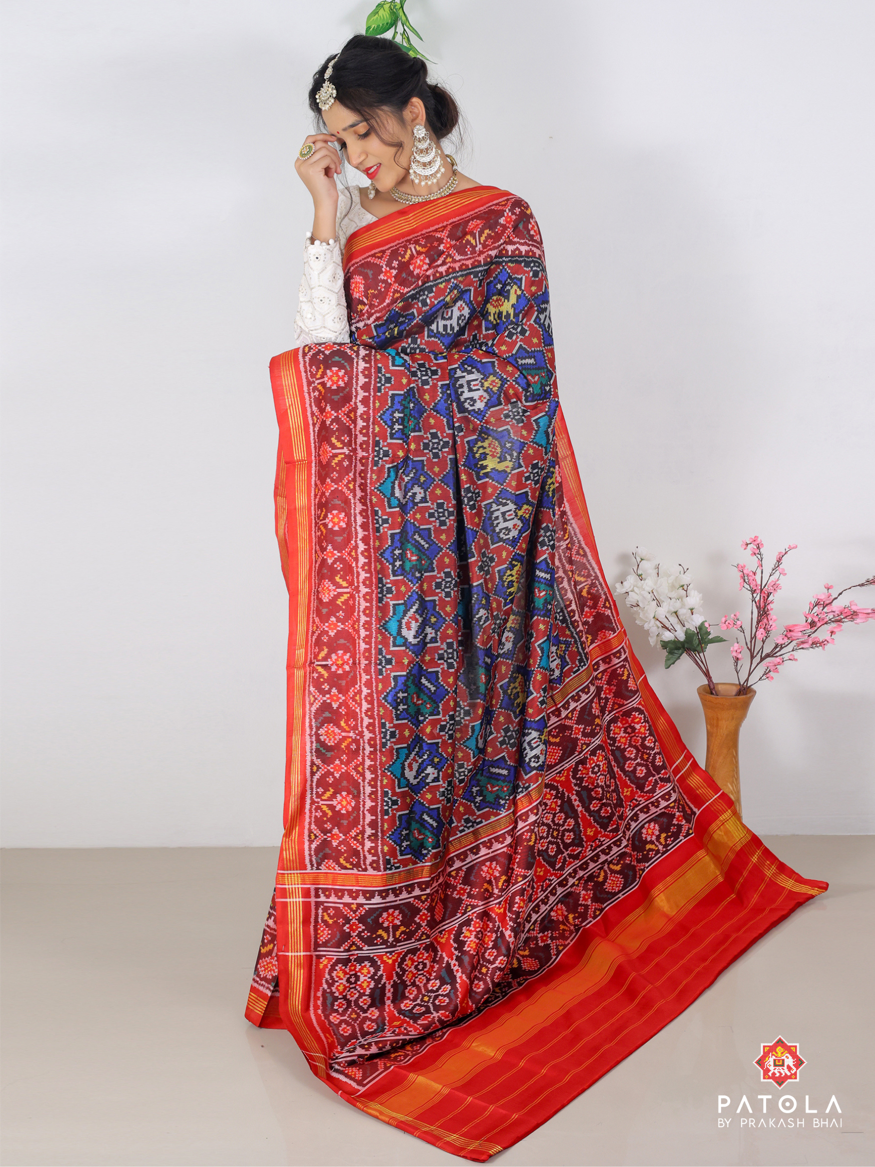 Figures With Star Designer Semi Double Ikat Patola Saree