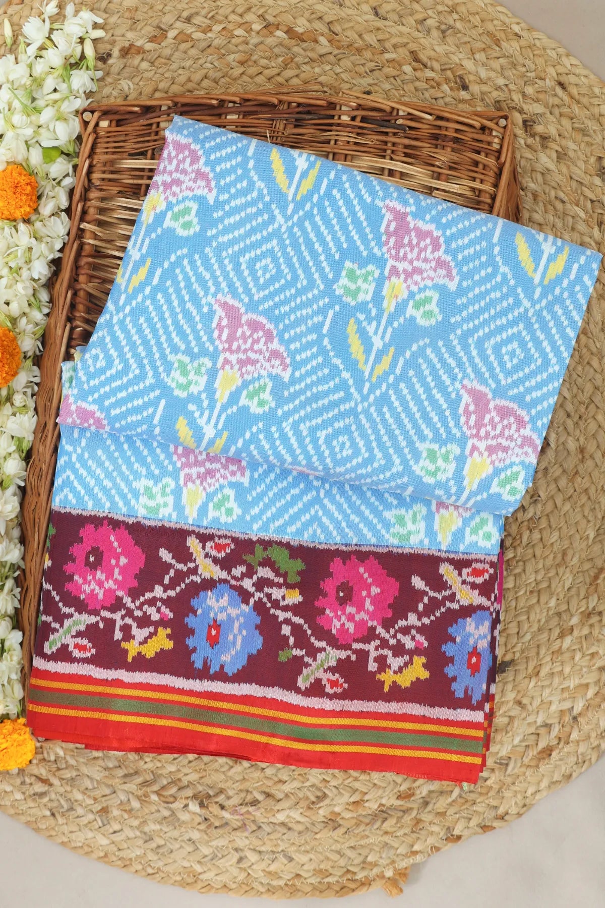 Master piece rose designer with contras flowers design with pallu border semi double ikat patola saree