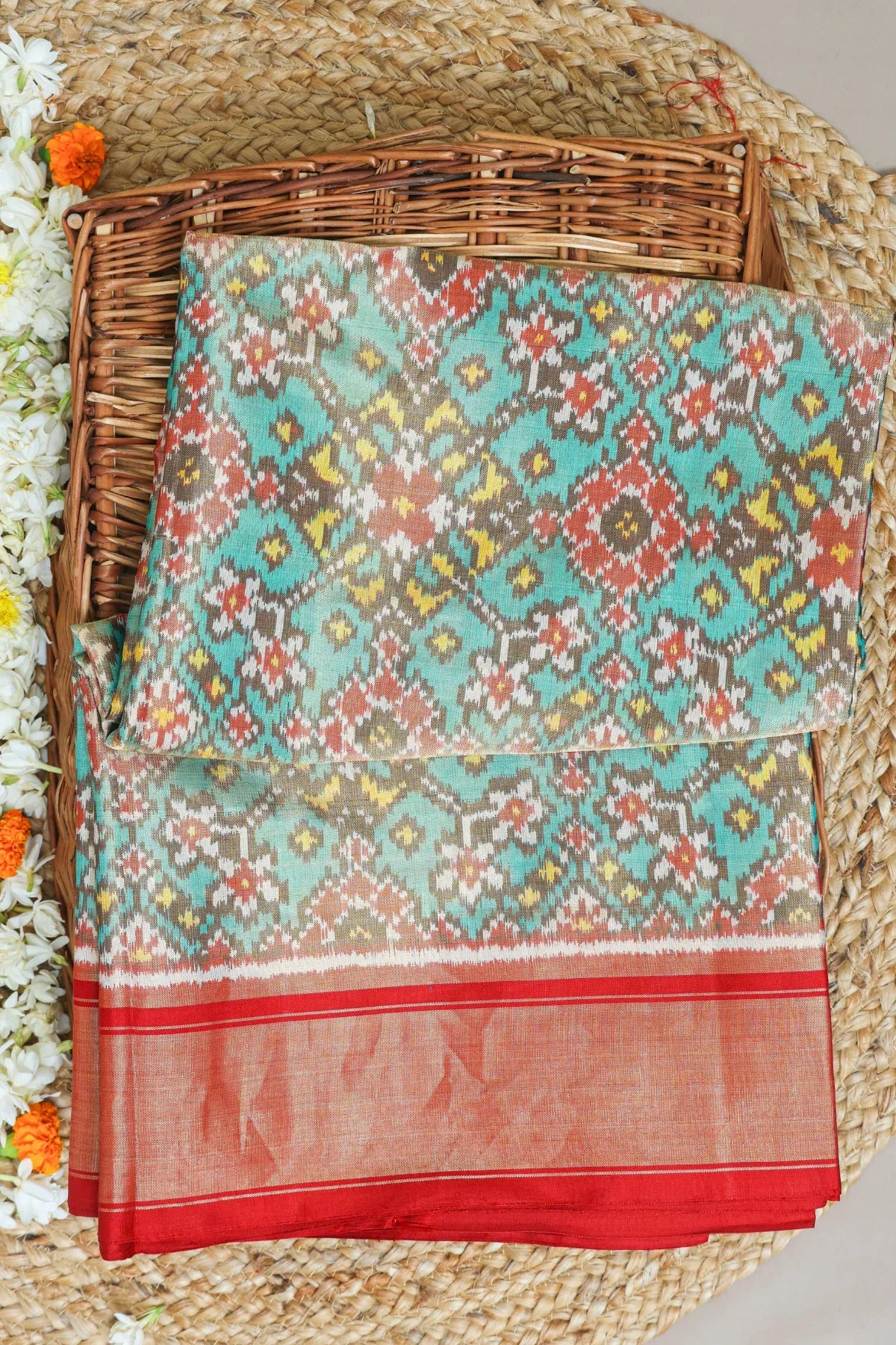 Navratna design with minakari work  tissue patola saree
