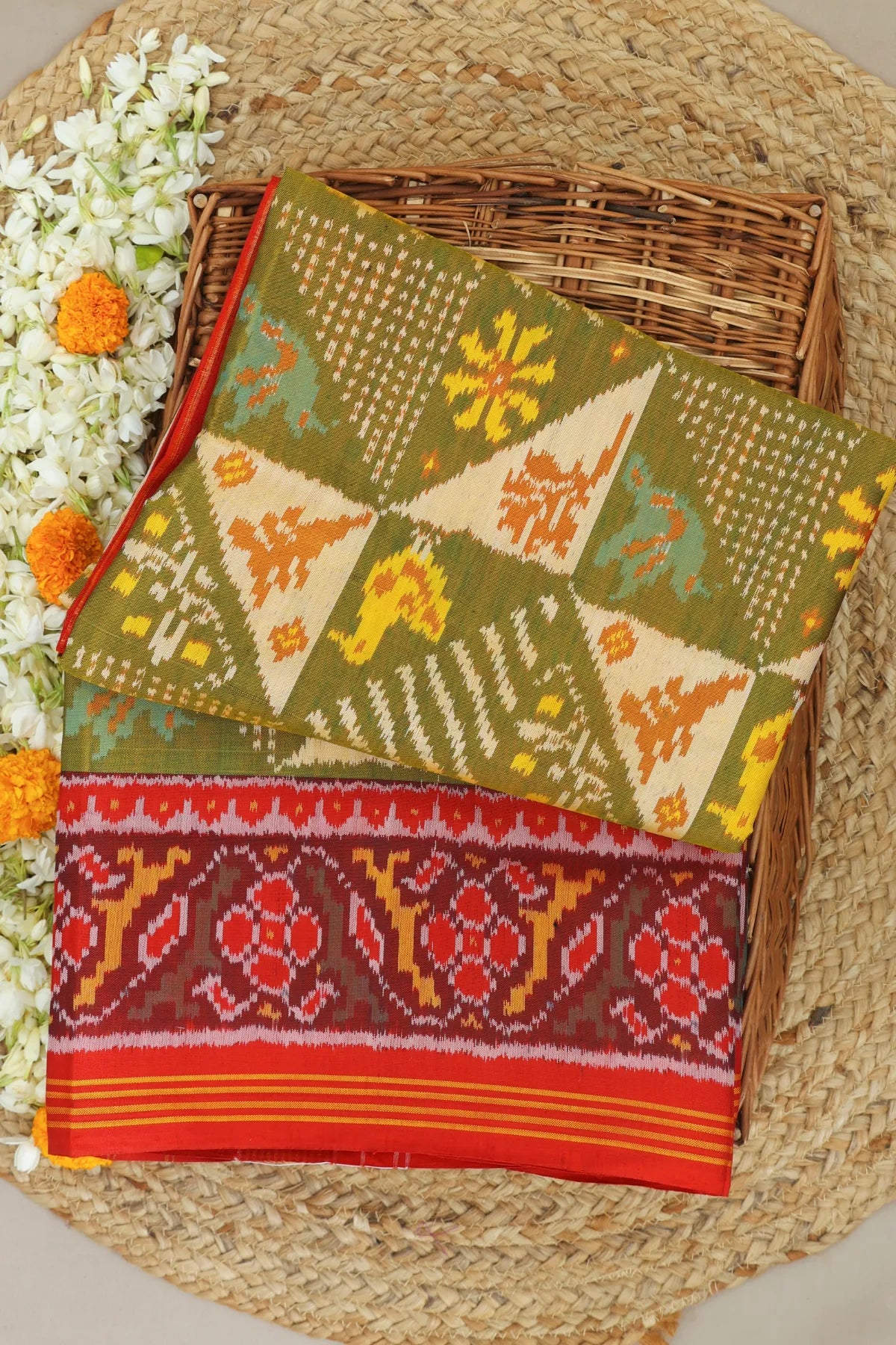 Funncy design with motif pallu border traditional design semi double ikat patola saree