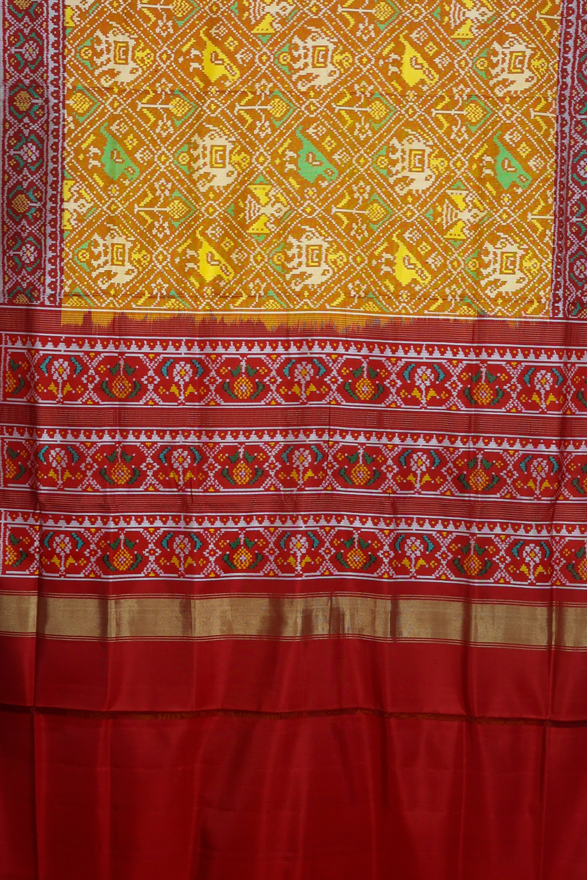 Traditional adtala design pallu border semi double ikat patola saree