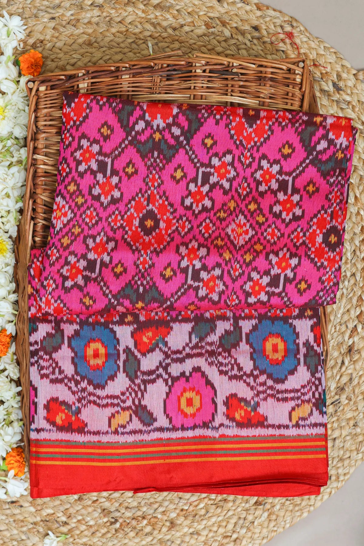 Navratna design with flowers border semi double ikat patola saree