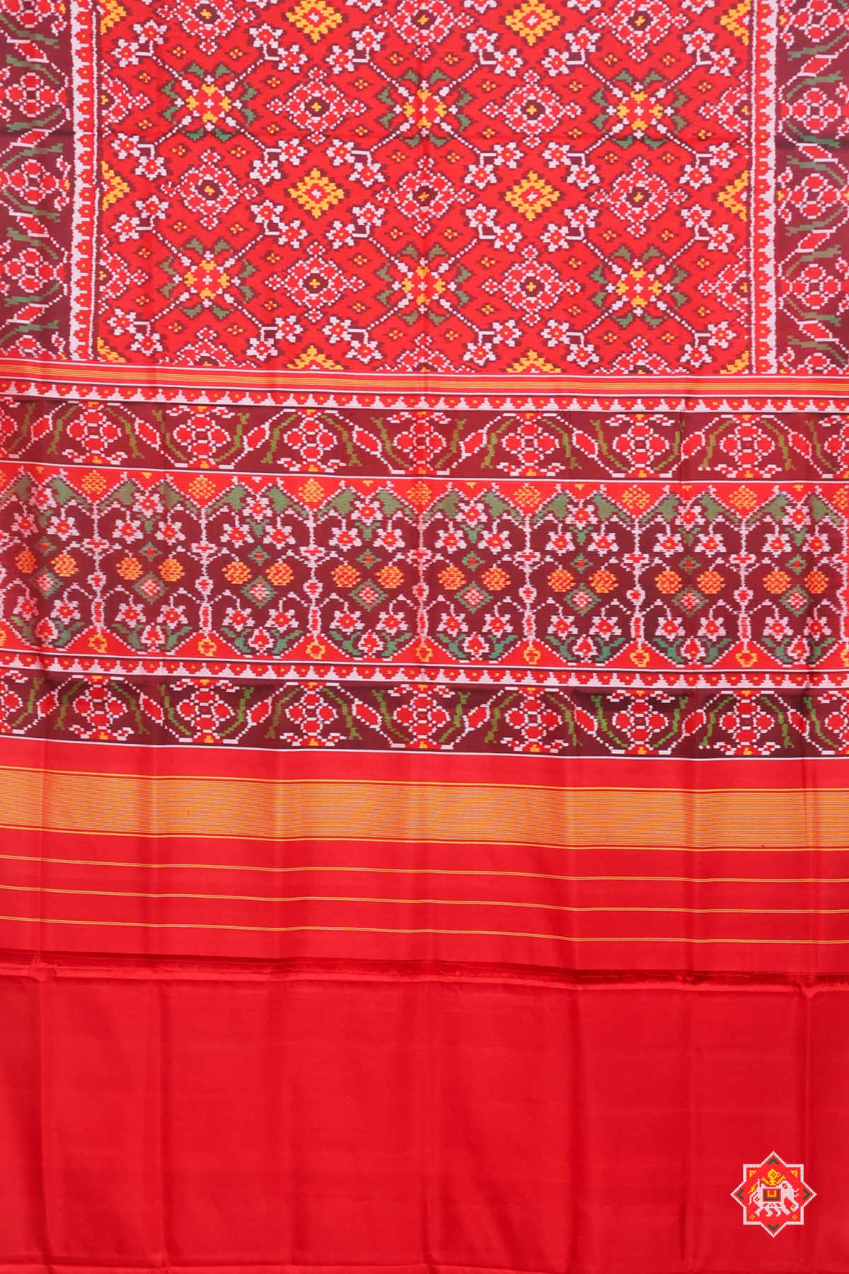 Traditional navratn design with minakari work pallu border self semi double ikat patola saree