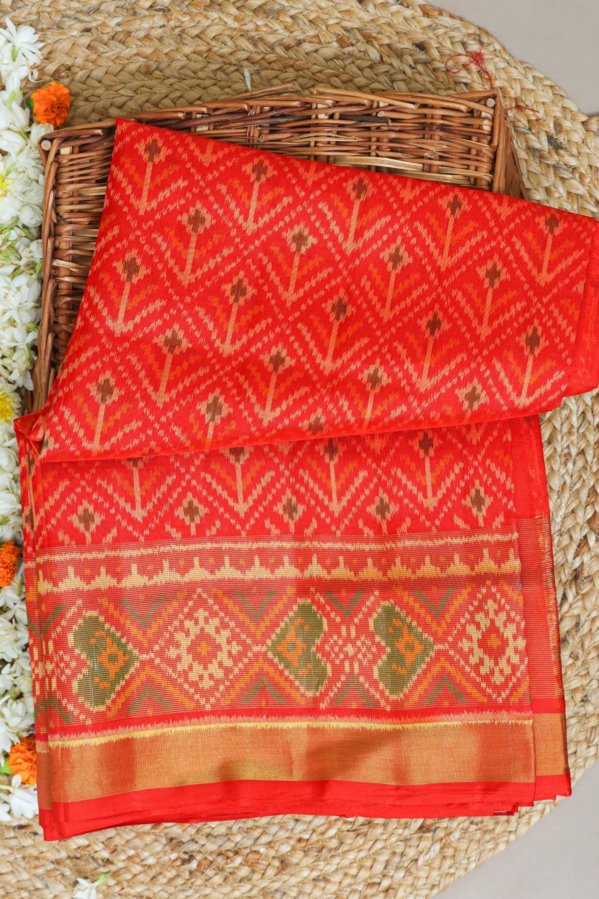 Plain color fancy flower design with tissue border single ikat patola saree