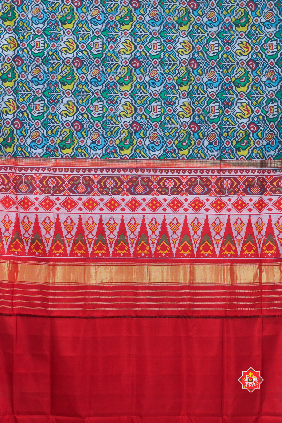 Masterpiece small motifs design minakari work semi double ikat patola saree