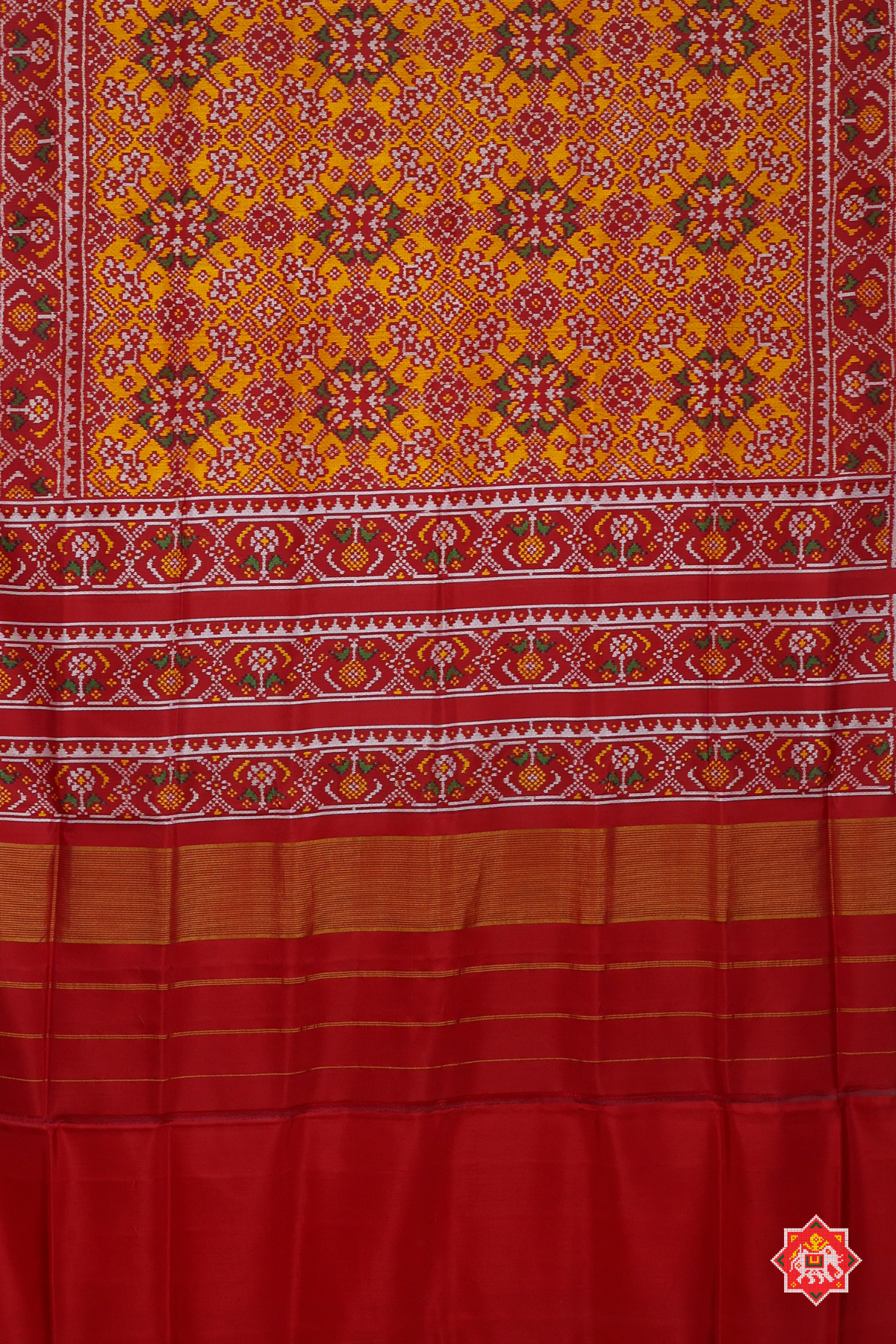 Navaratna design minakari work with ghughroo border semi double ikat patola saree