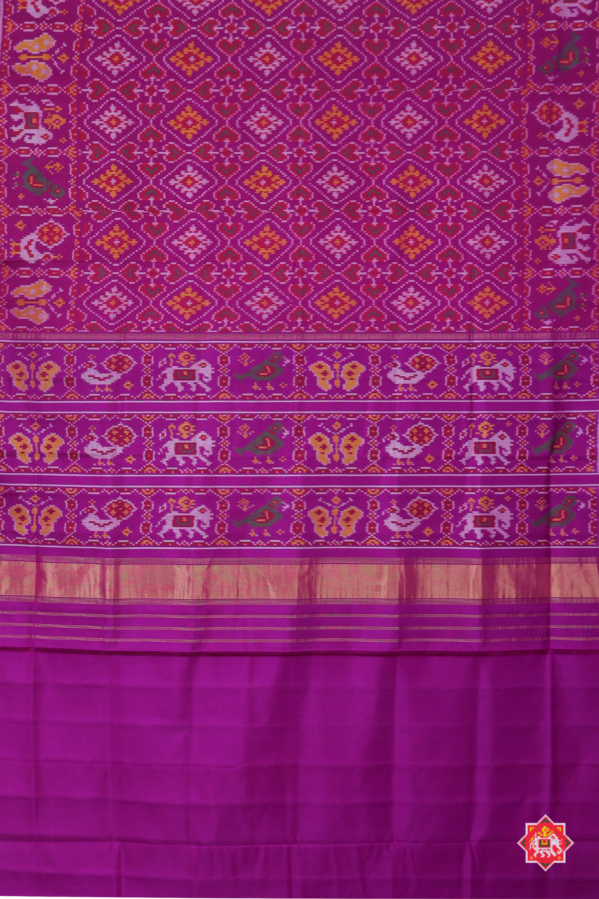 Traditional paan chnada design with motif border semi double ikat patola saree