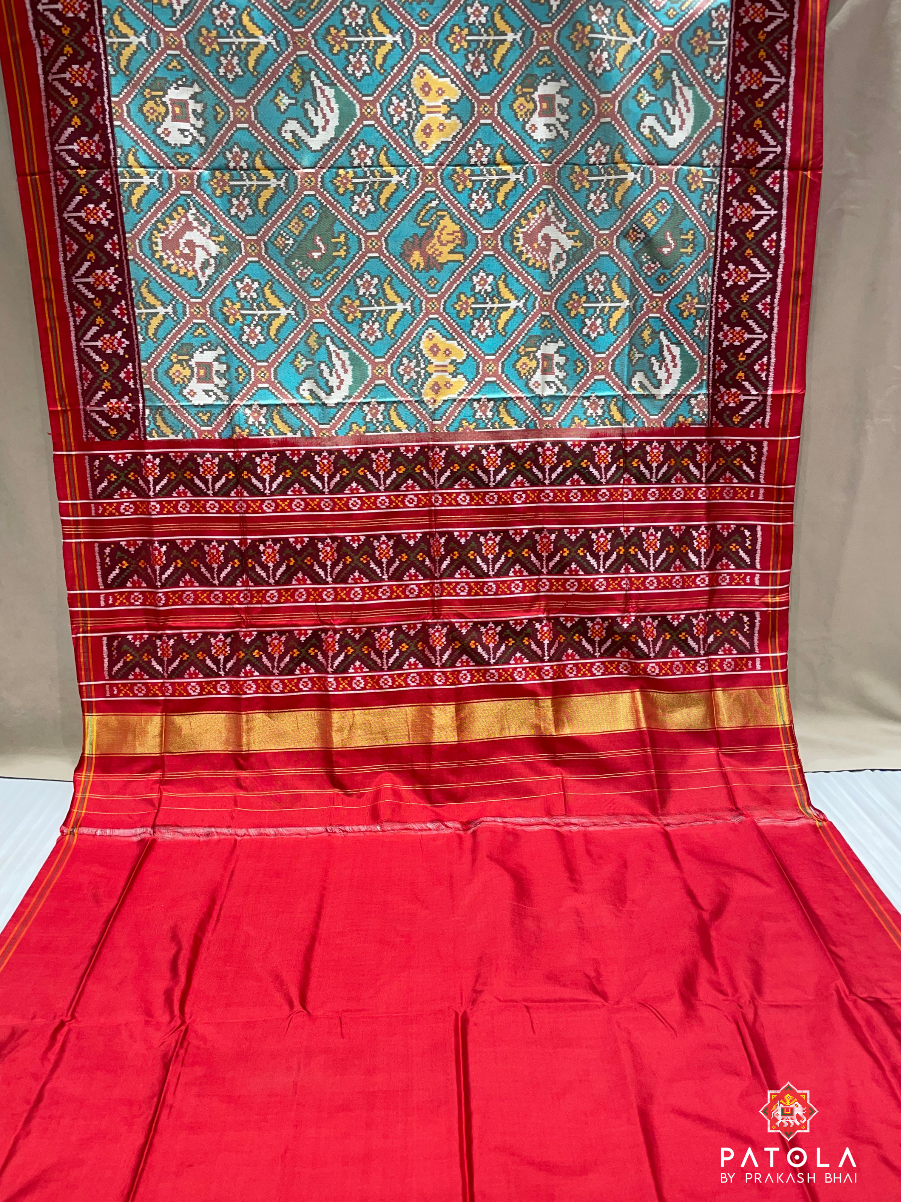 C-Green Big Narikunj Adtala Designer Semi Double Ikat Patola Saree