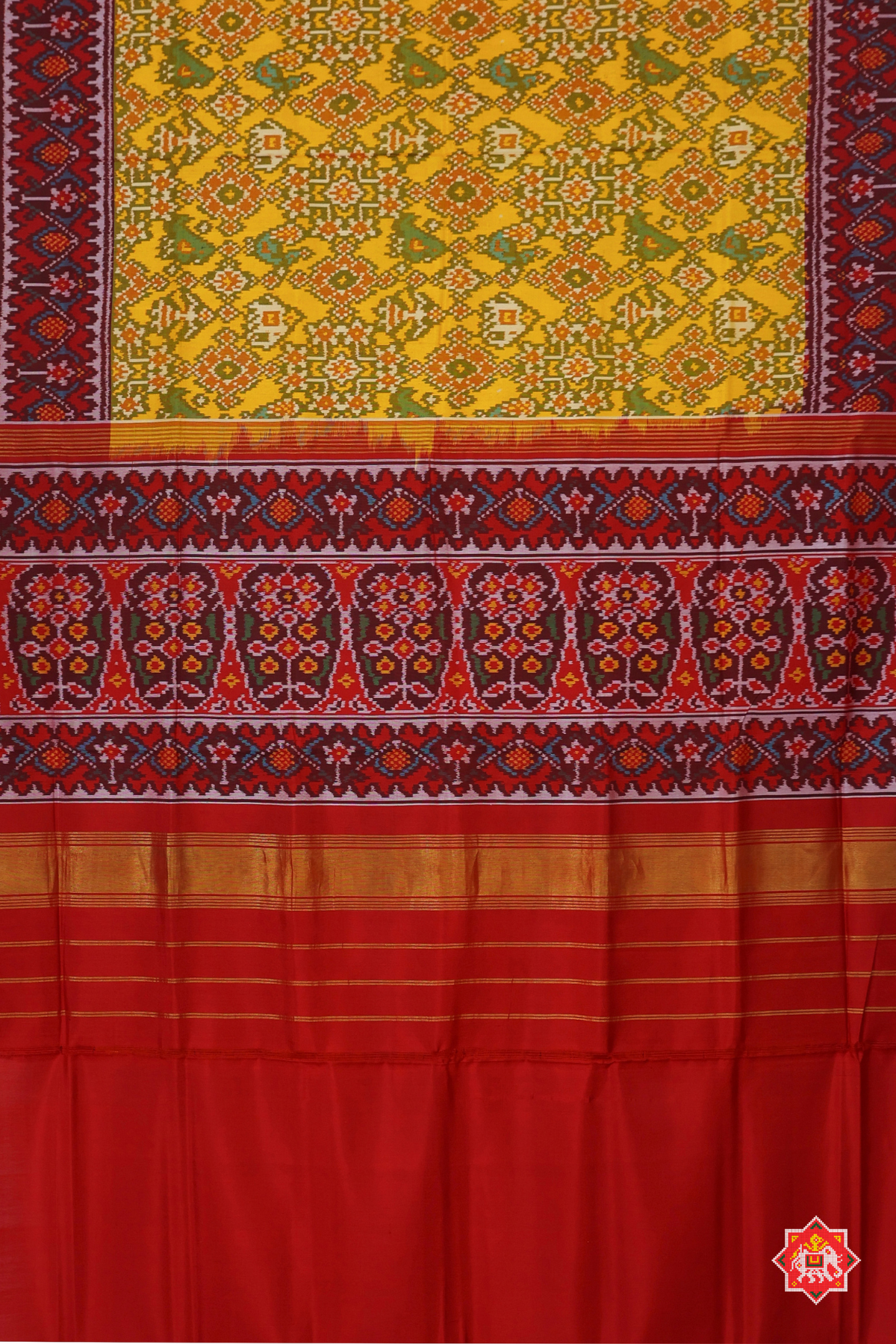 Navaratna with motif design & pallu border contras semi double ikat patola saree