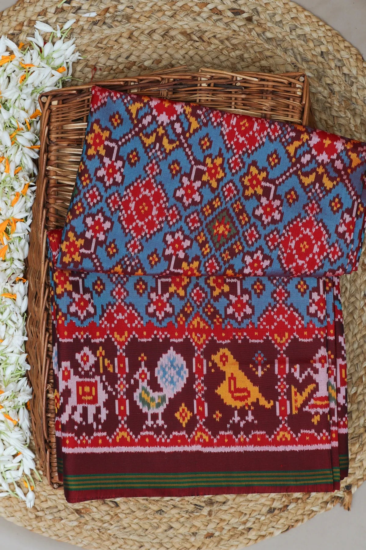 Traditional navratna design with pallu border motif design  semi double ikat patola saree
