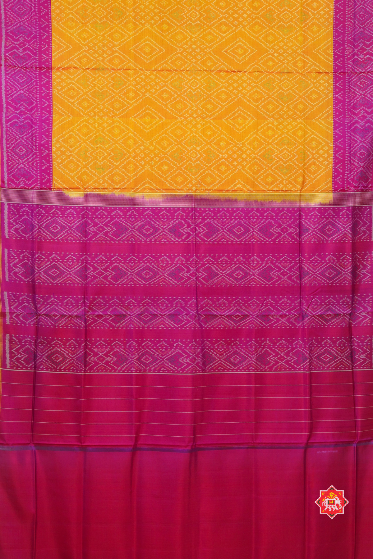 Bandhani design with small tissue border design single ikat patola saree