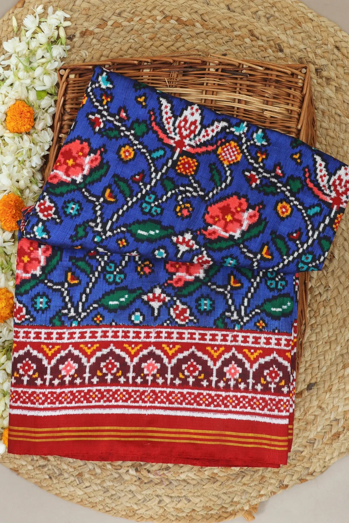 Patan patola traditional master piece rangoli design with border pallu motif design double ikat saree