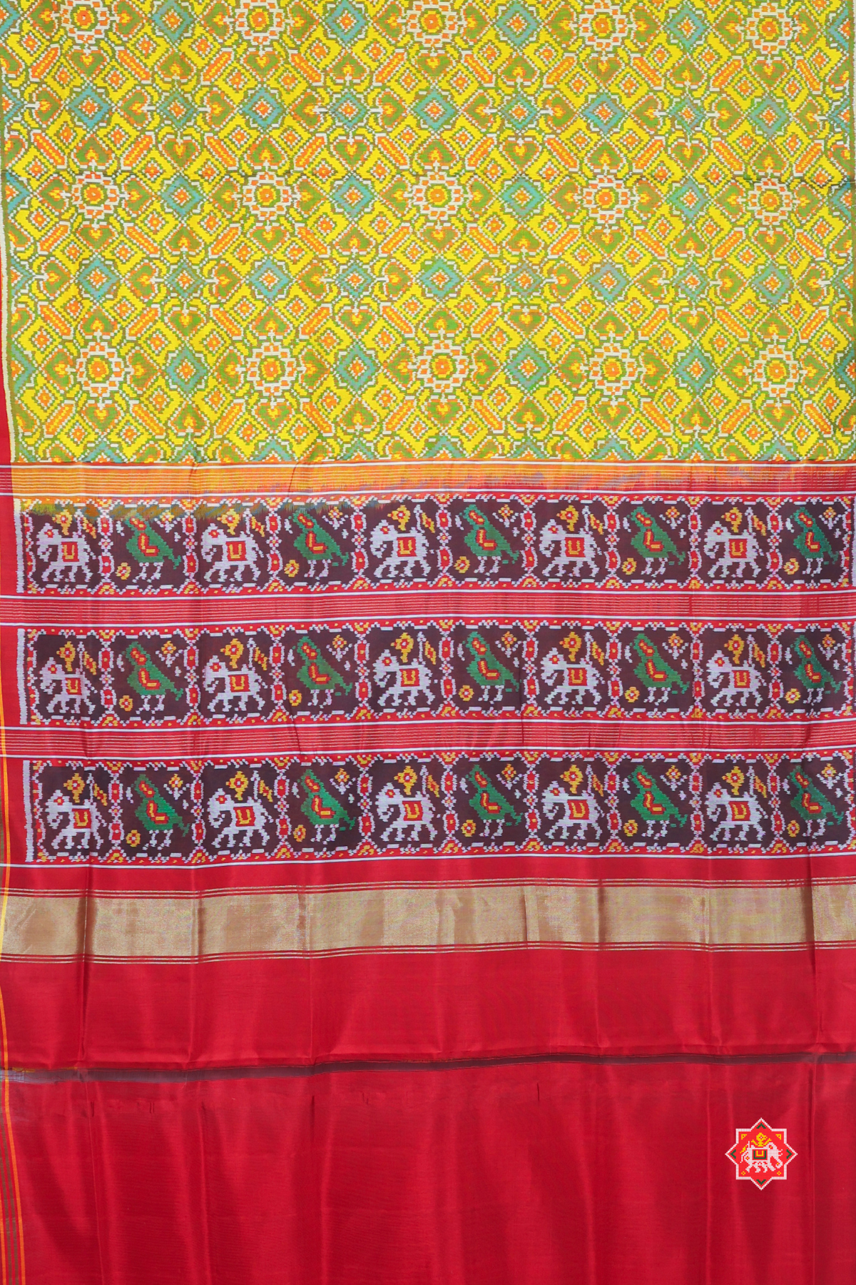 Paan chanda design with minakari work semi double ikat patola saree