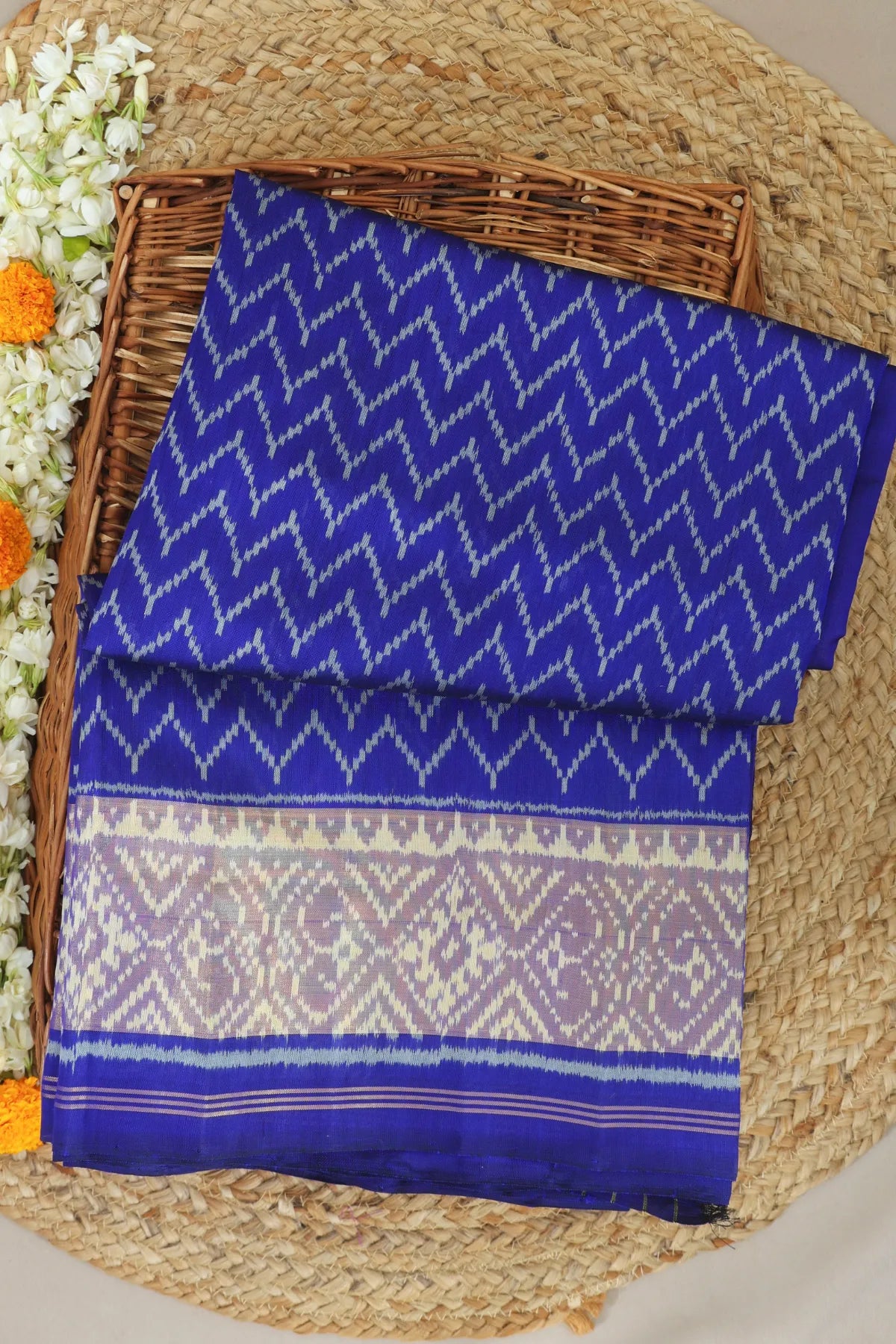 Zig-zag design with tissue border pallu single ikat patola saree