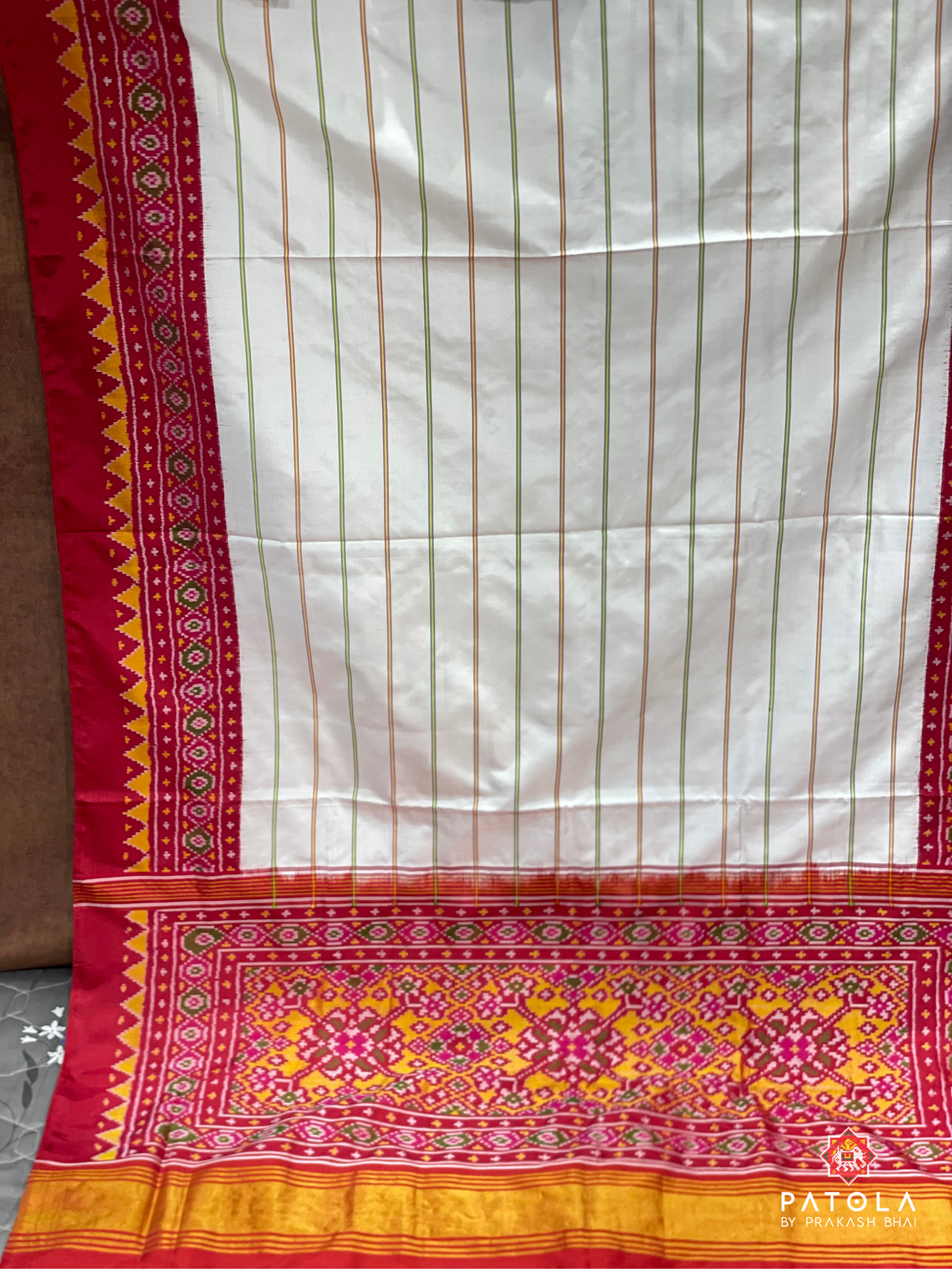 Vertical Lines With Traditional Patola Design Blouse Semi Double Ikat Saree