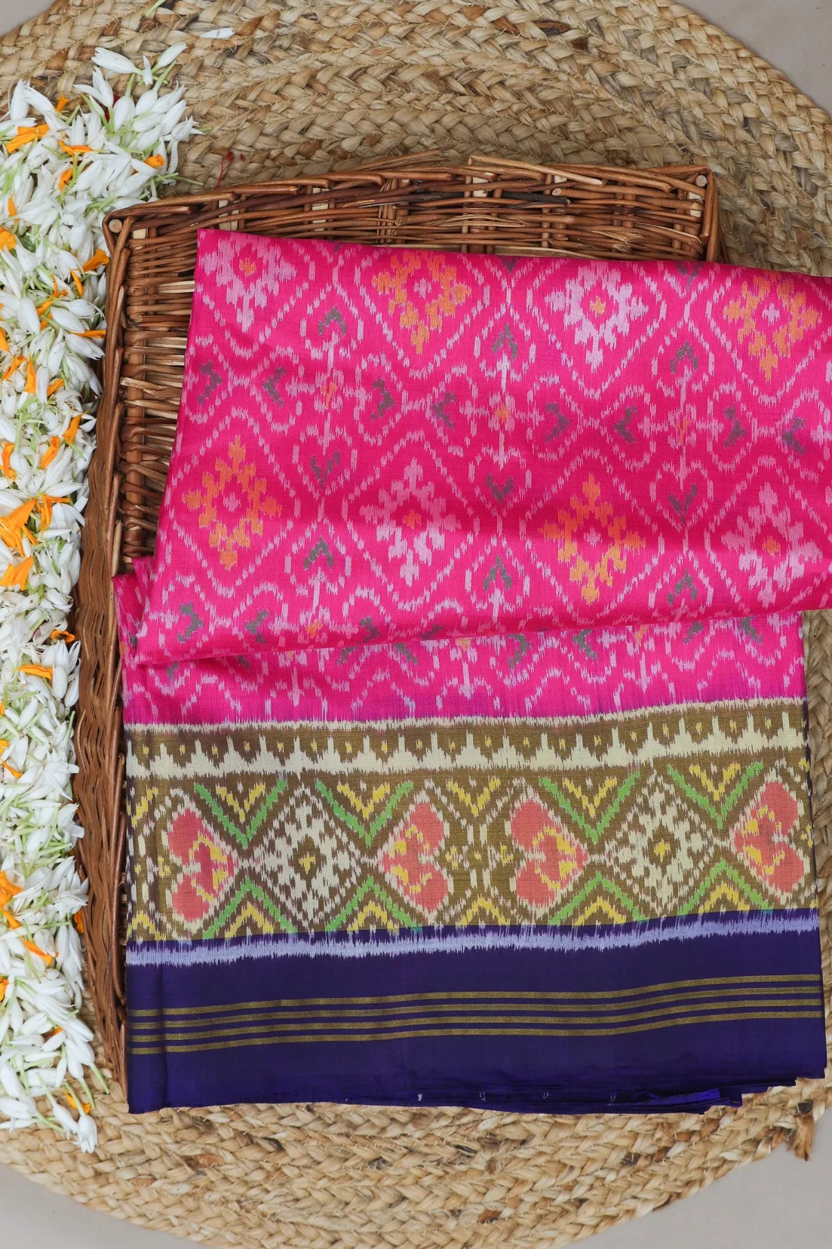 Paan chanda design with tissue border single ikat patola saree