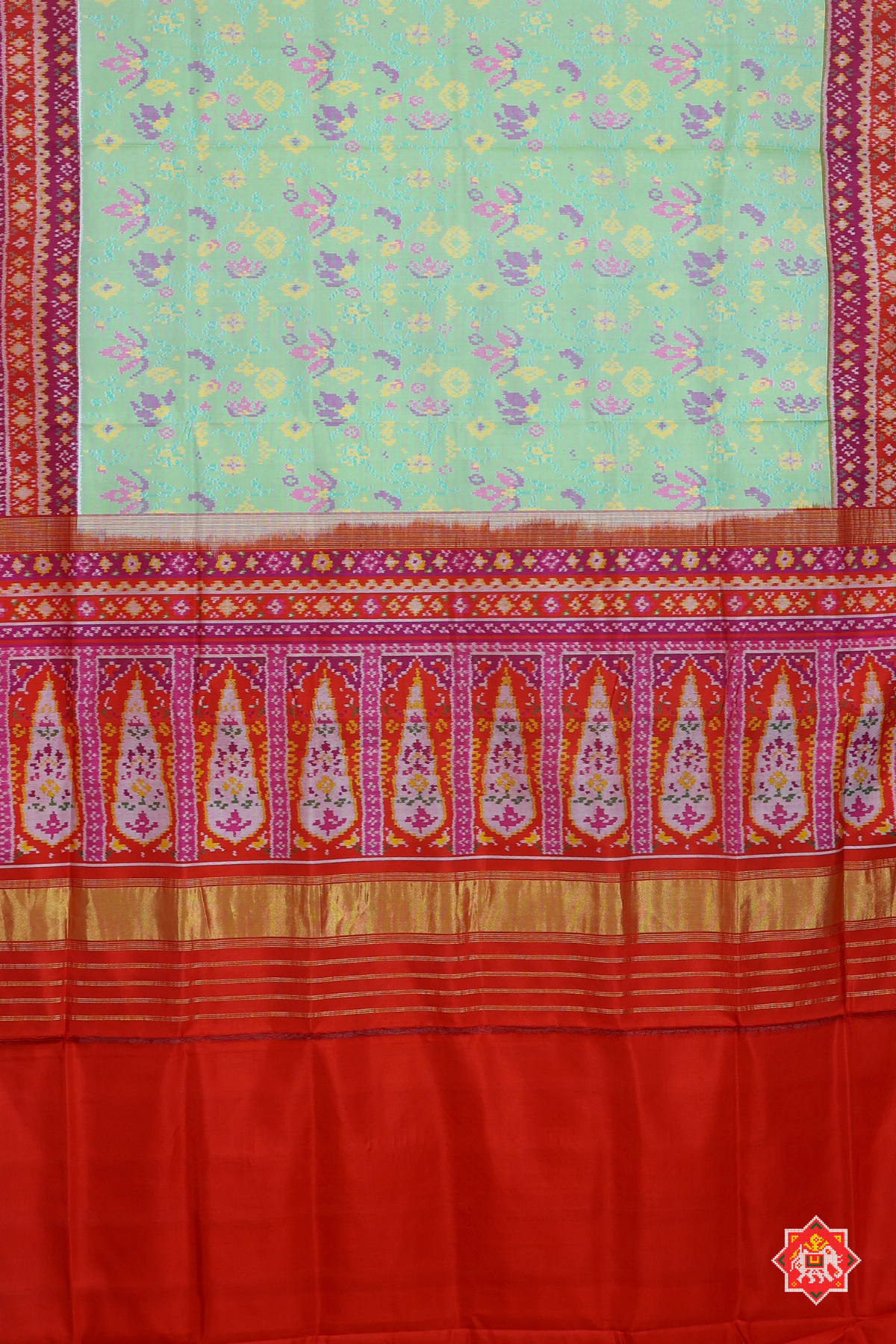Masterpiece white flowers vel design semi double ikat patola saree
