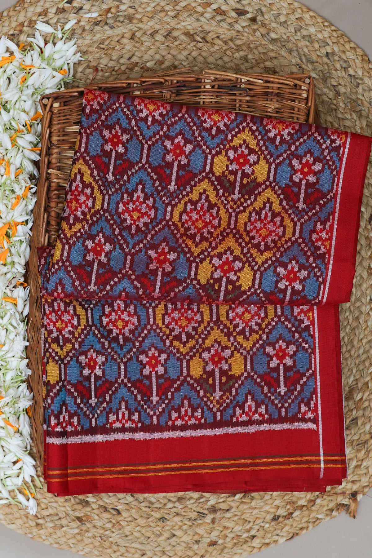 Traditional small flower design & pallu minakari work semi double ikat patola saree