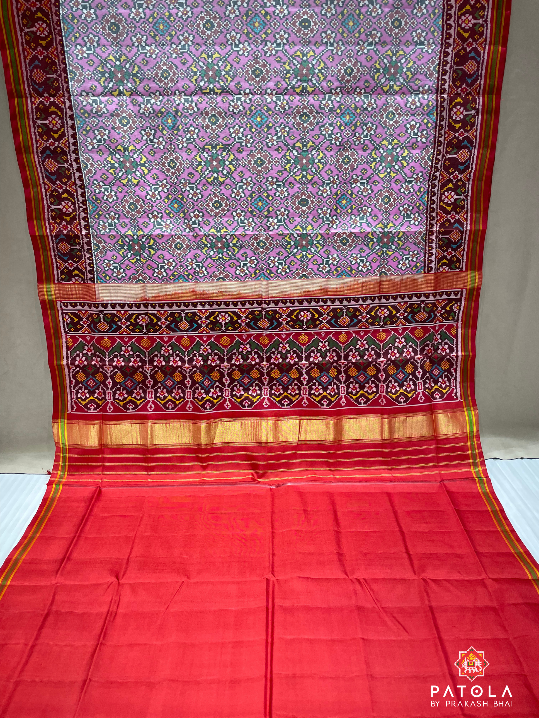 Pastel Pink Navratna Designer Semi Double Ikat Patola Saree