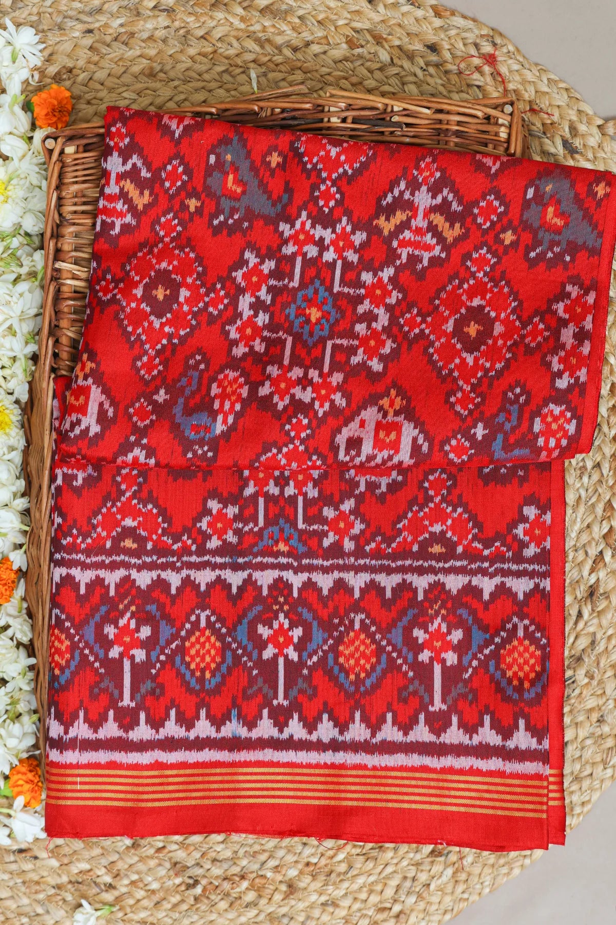 Traditional navratna with motifs design palllu border flowers design semi double ikat patola saree
