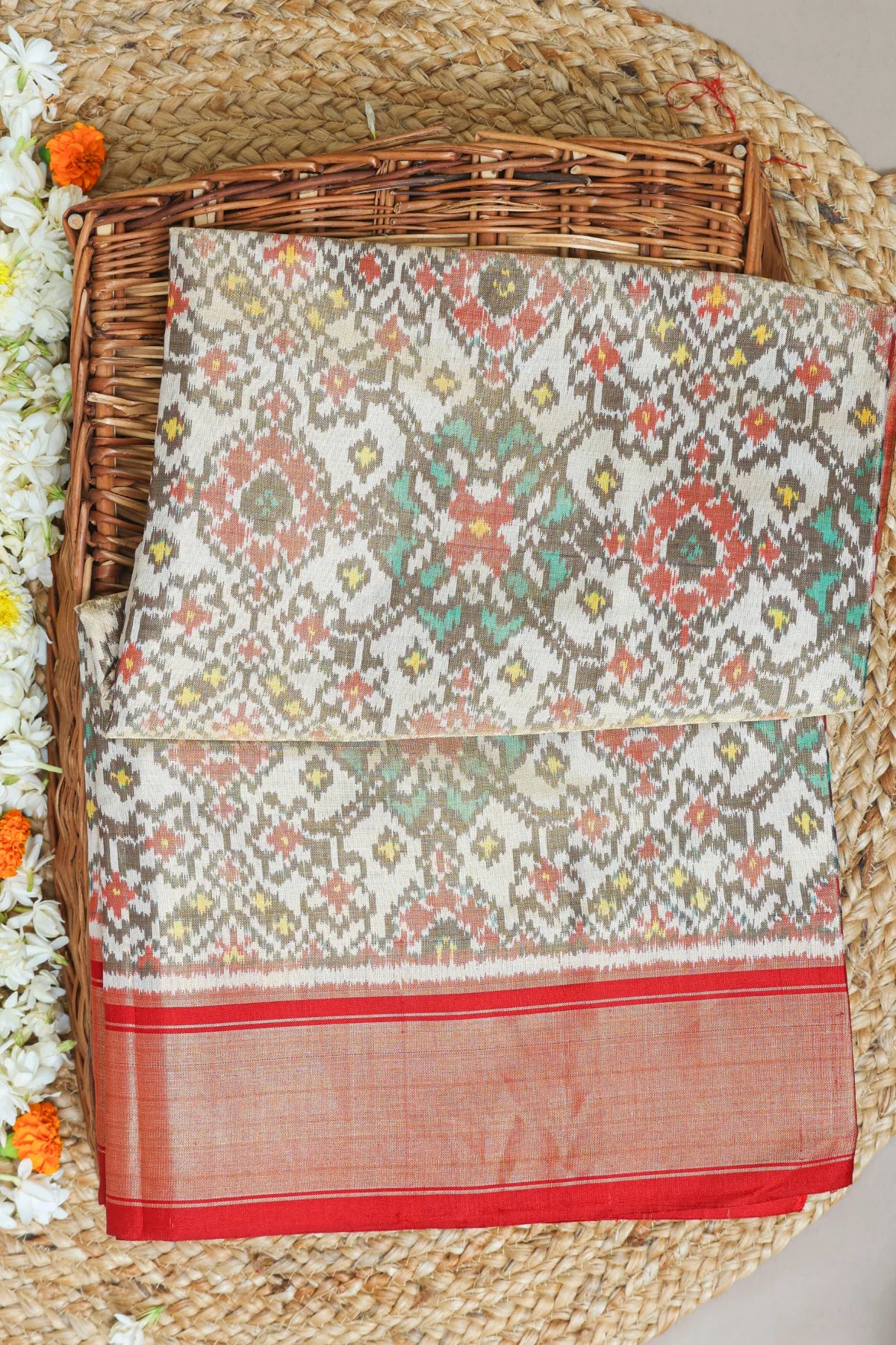 Navratna design with minakari work  tissue patola saree