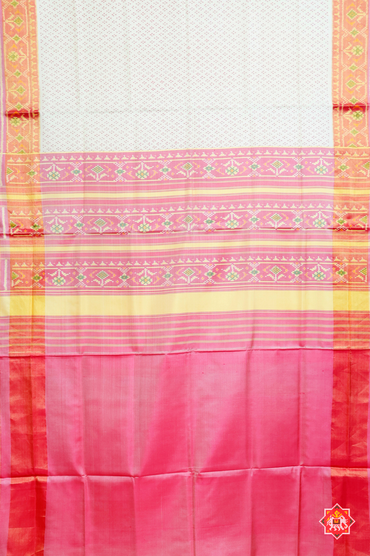 Small dots with tissue border single ikat patola saree
