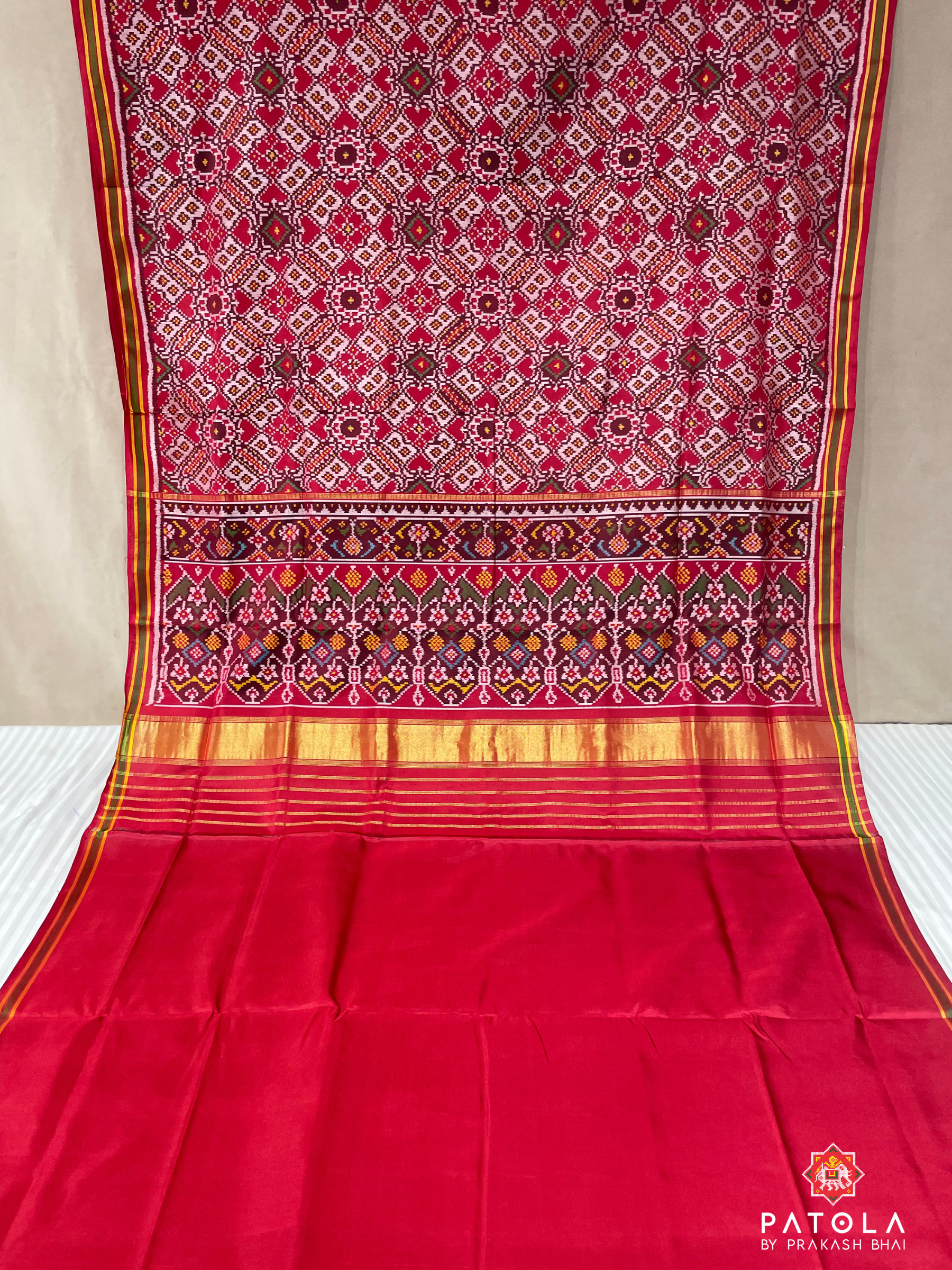 Off-White With Red Manekchowk Designer Semi Double Ikat Patola Saree