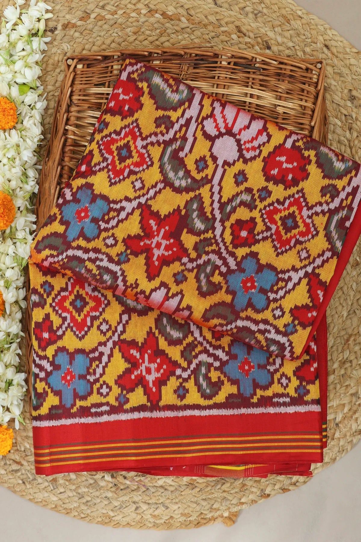 Rangoli design with lines border traditional design  pallu semi double ikat patola saree