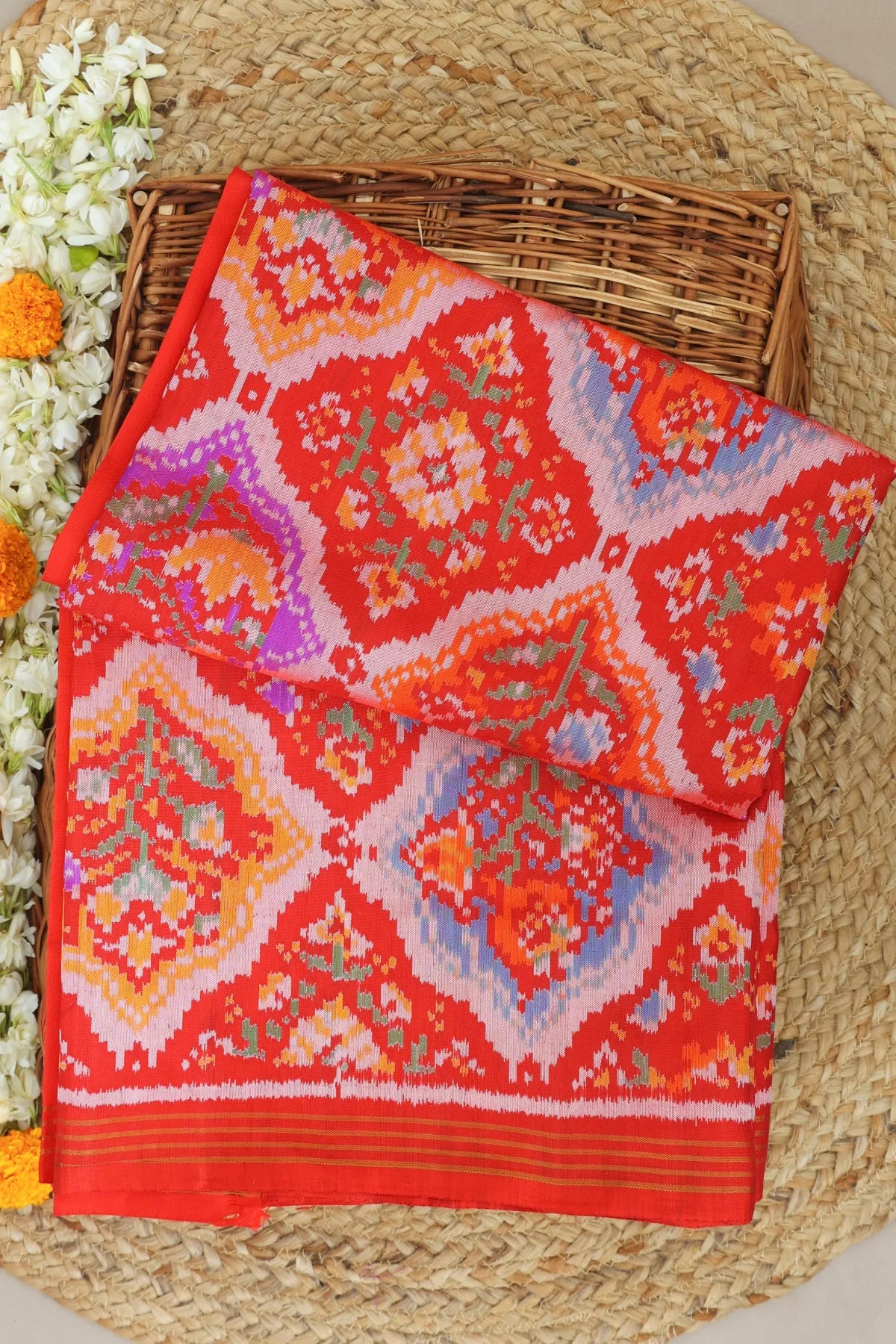 Stylis floral design with small border semi double ikat patola saree