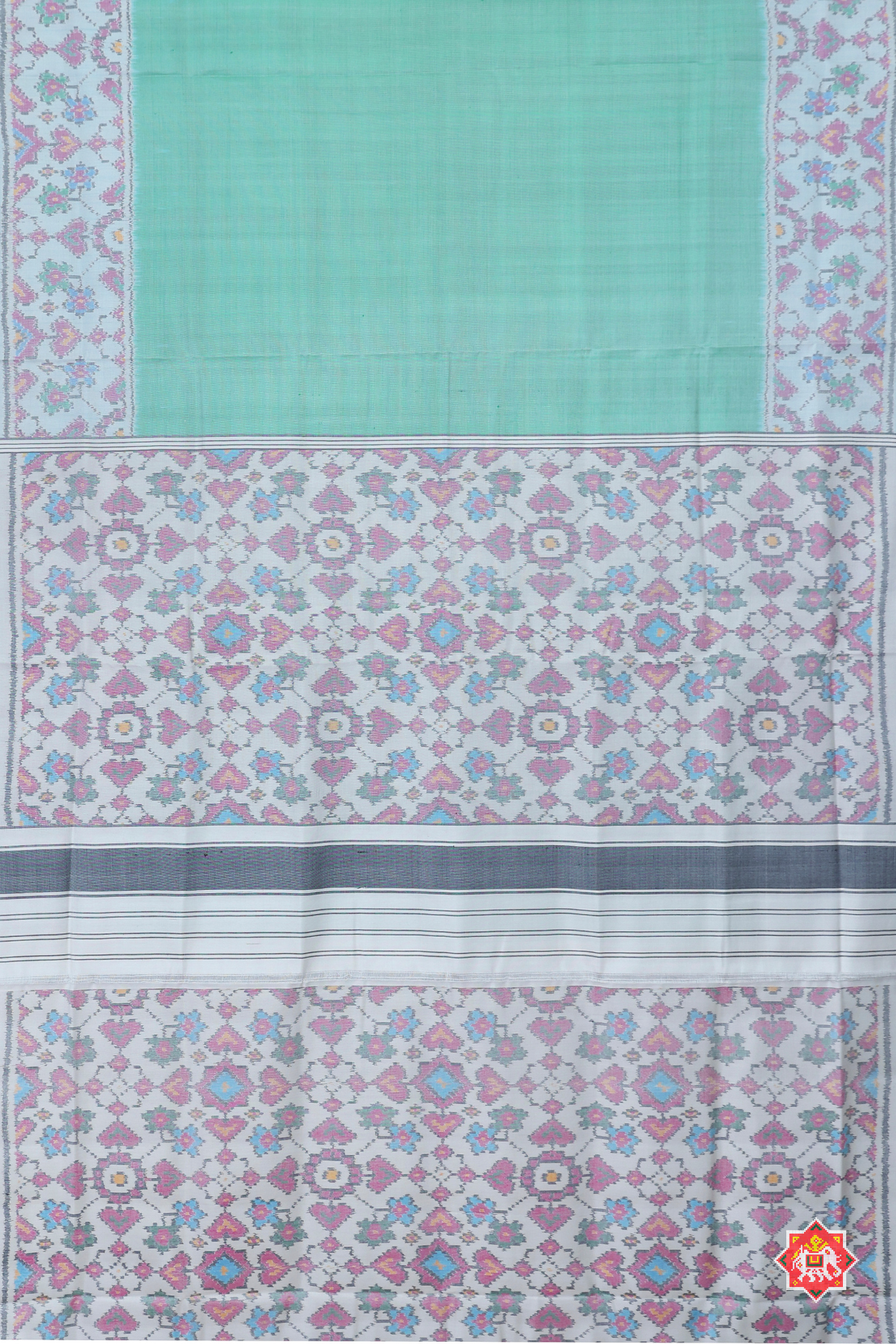 Plain pista with off-white navratna manek chowk border & blouse patola design semi double ikat patola saree