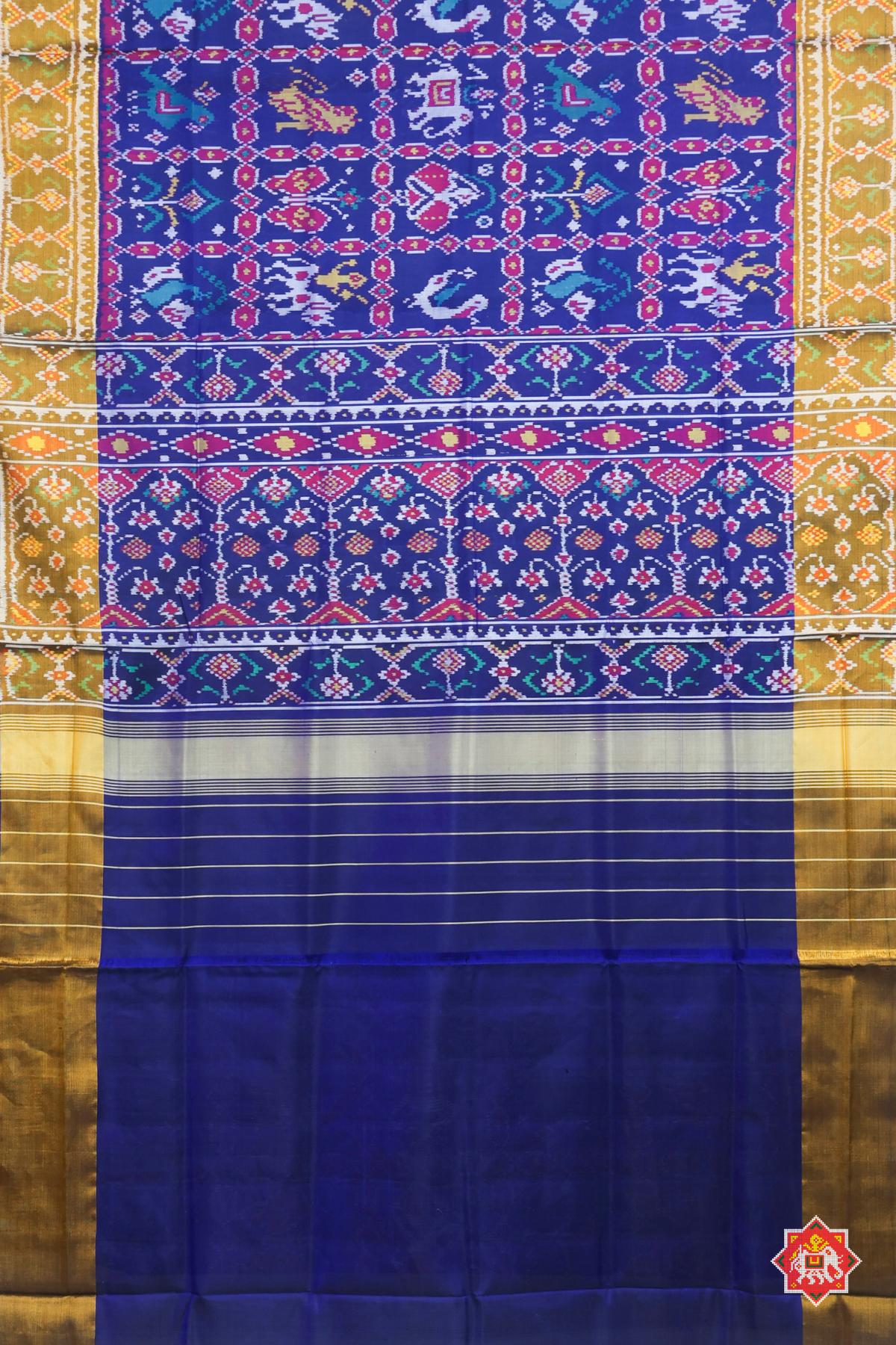 Maserpiece 9 motif design with tissue border single ikat patola saree