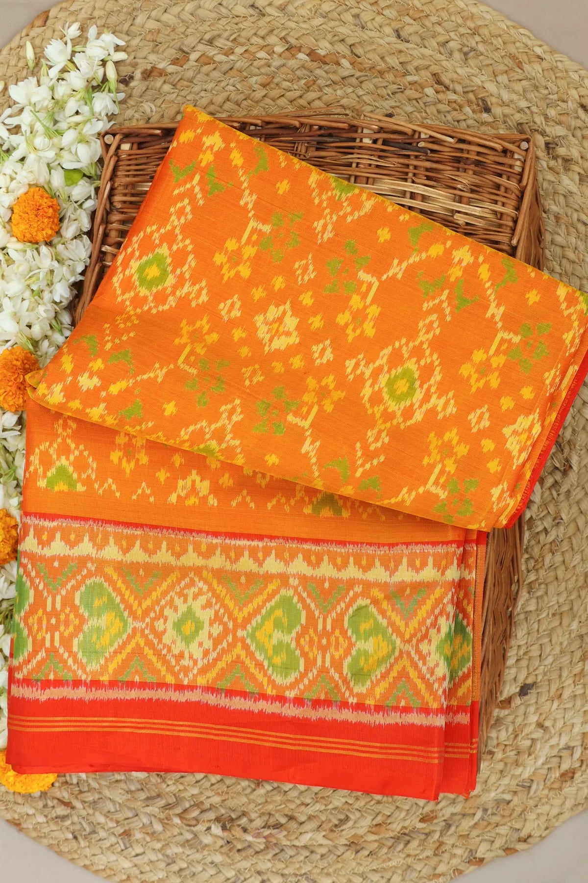 Navratna design with pallu border contras single ikat patola saree