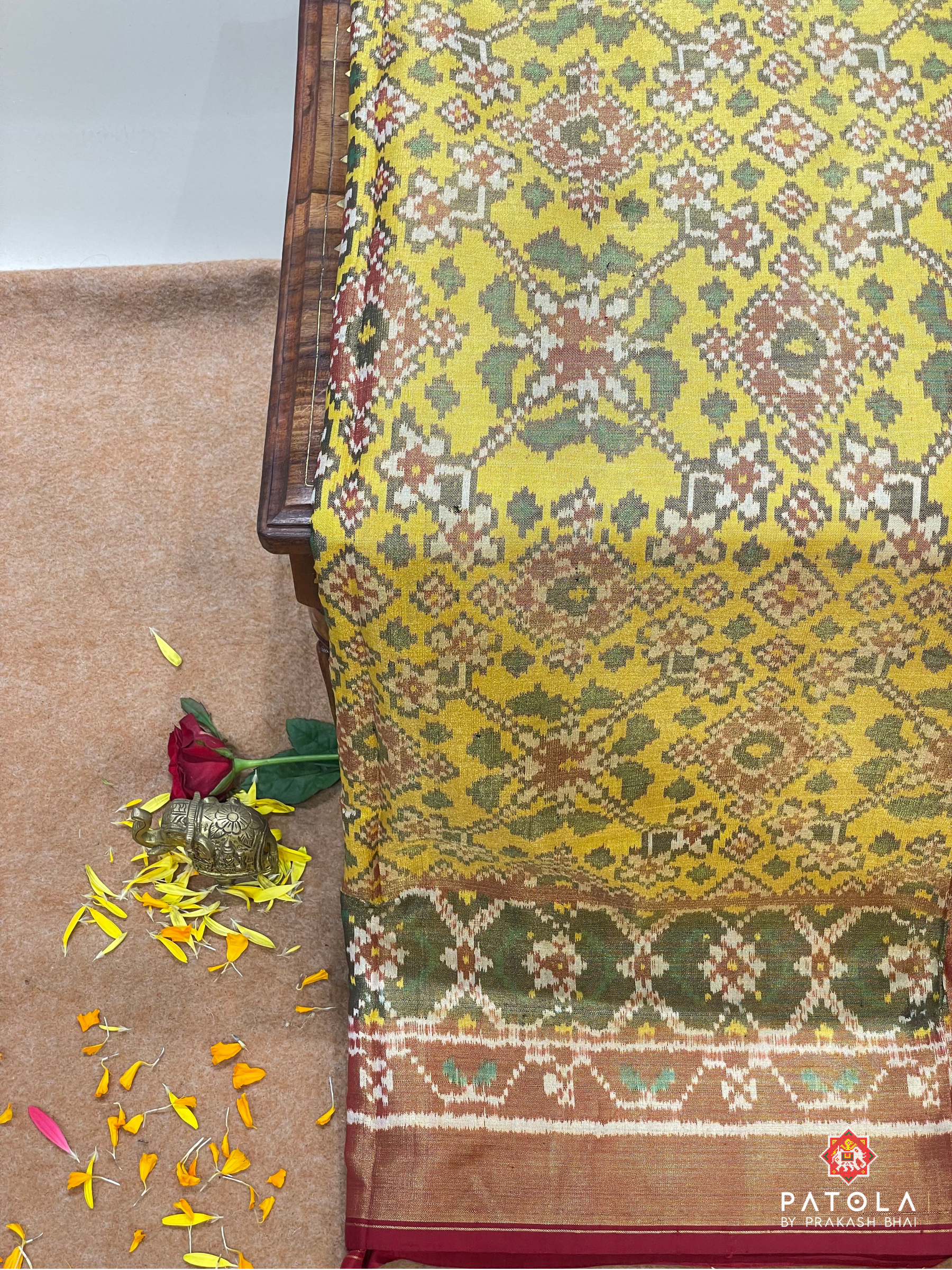 Traditional Navratna Design With Small Border Tissue Patola Saree