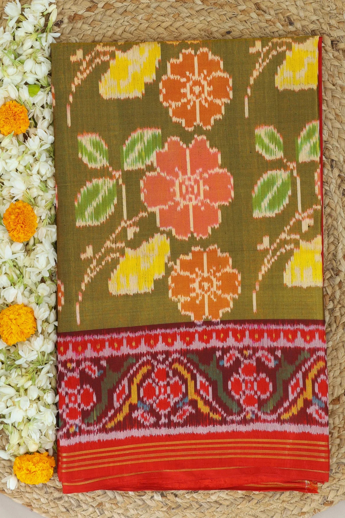 Funncy flower design with pallu border traditional design semi double ikat patola saree